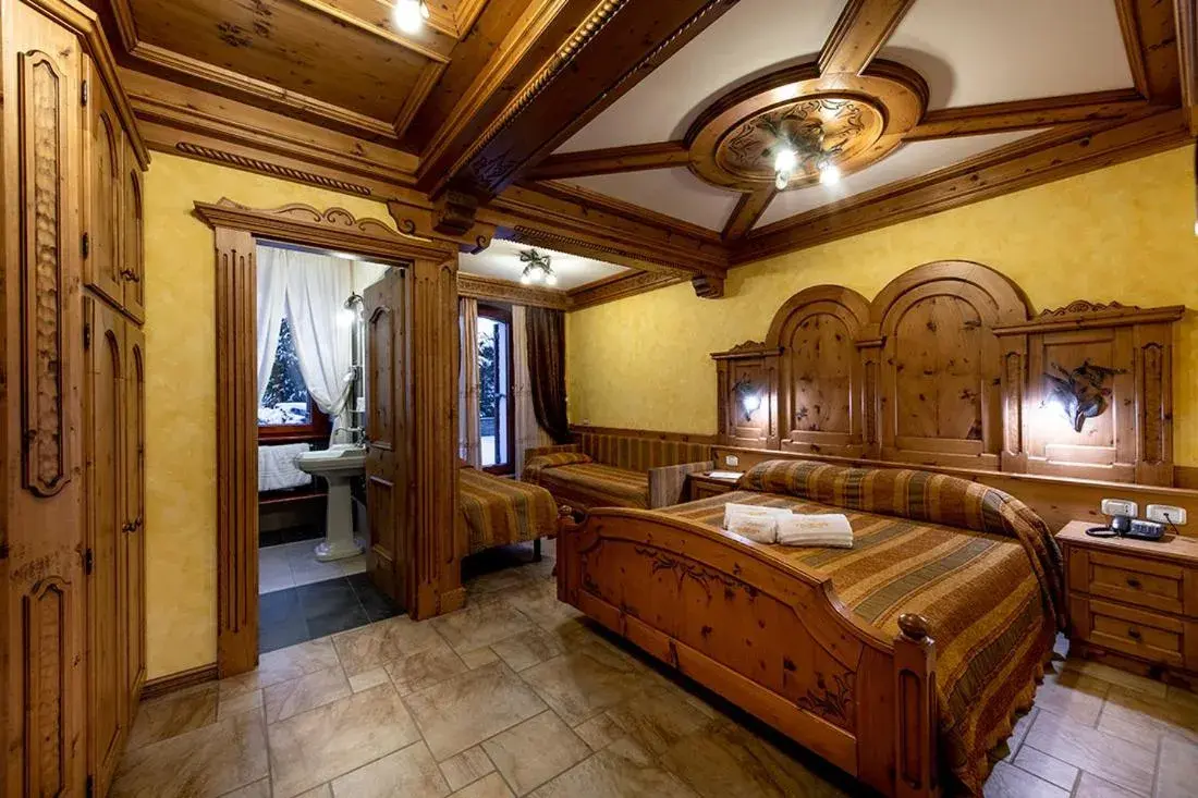 Quadruple Room in Hotel Le Ortensie Quadruple Room in Hotel Le Ortensie