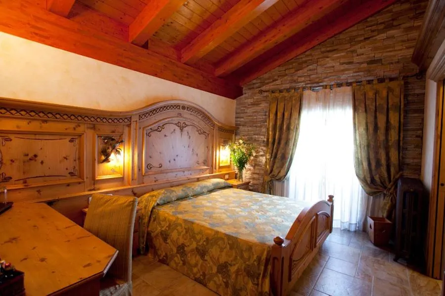 Bed in Hotel Le Ortensie