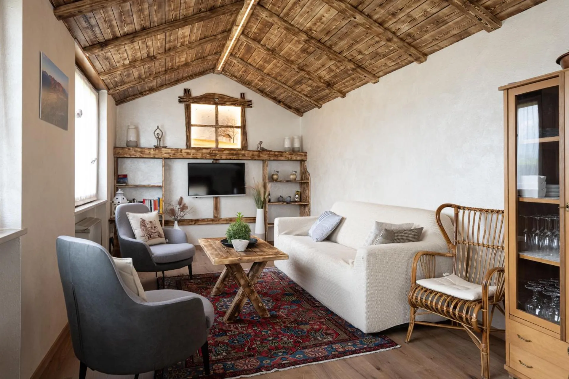 Communal lounge/ TV room in Piccolo Orso Bruno