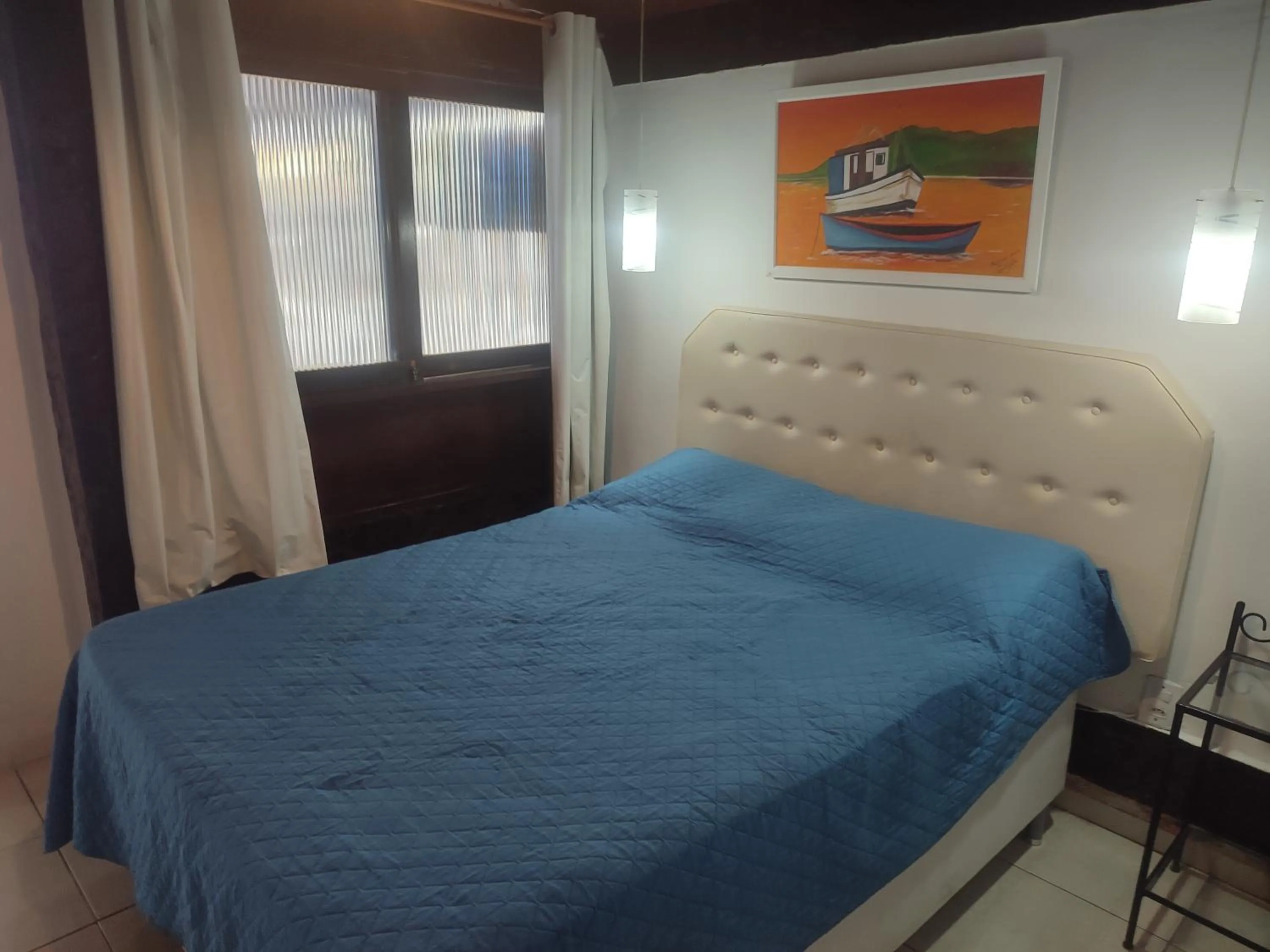 Bed in Pousada L'étage