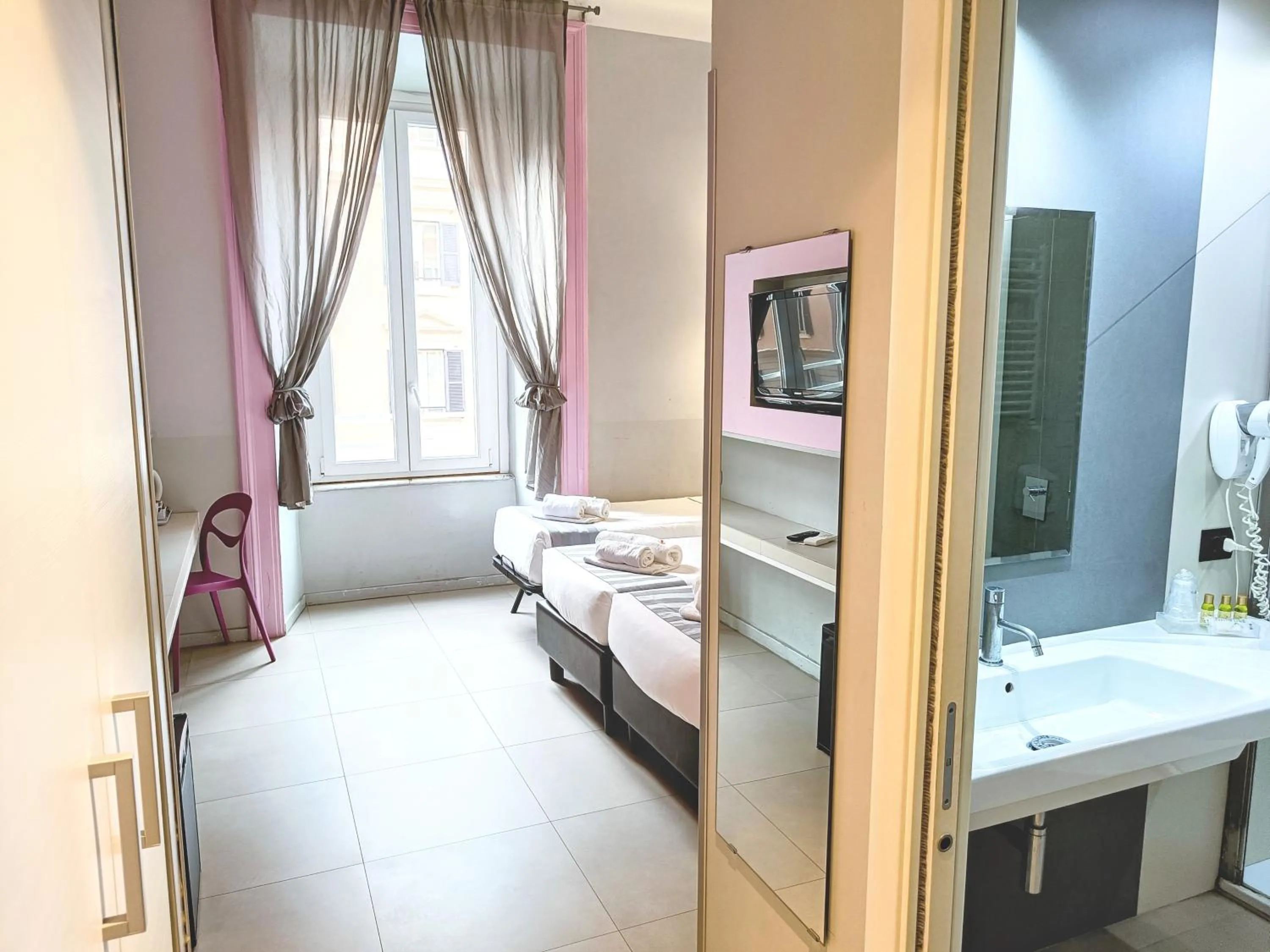 Photo of the whole room, Bed in Manin Suites LT