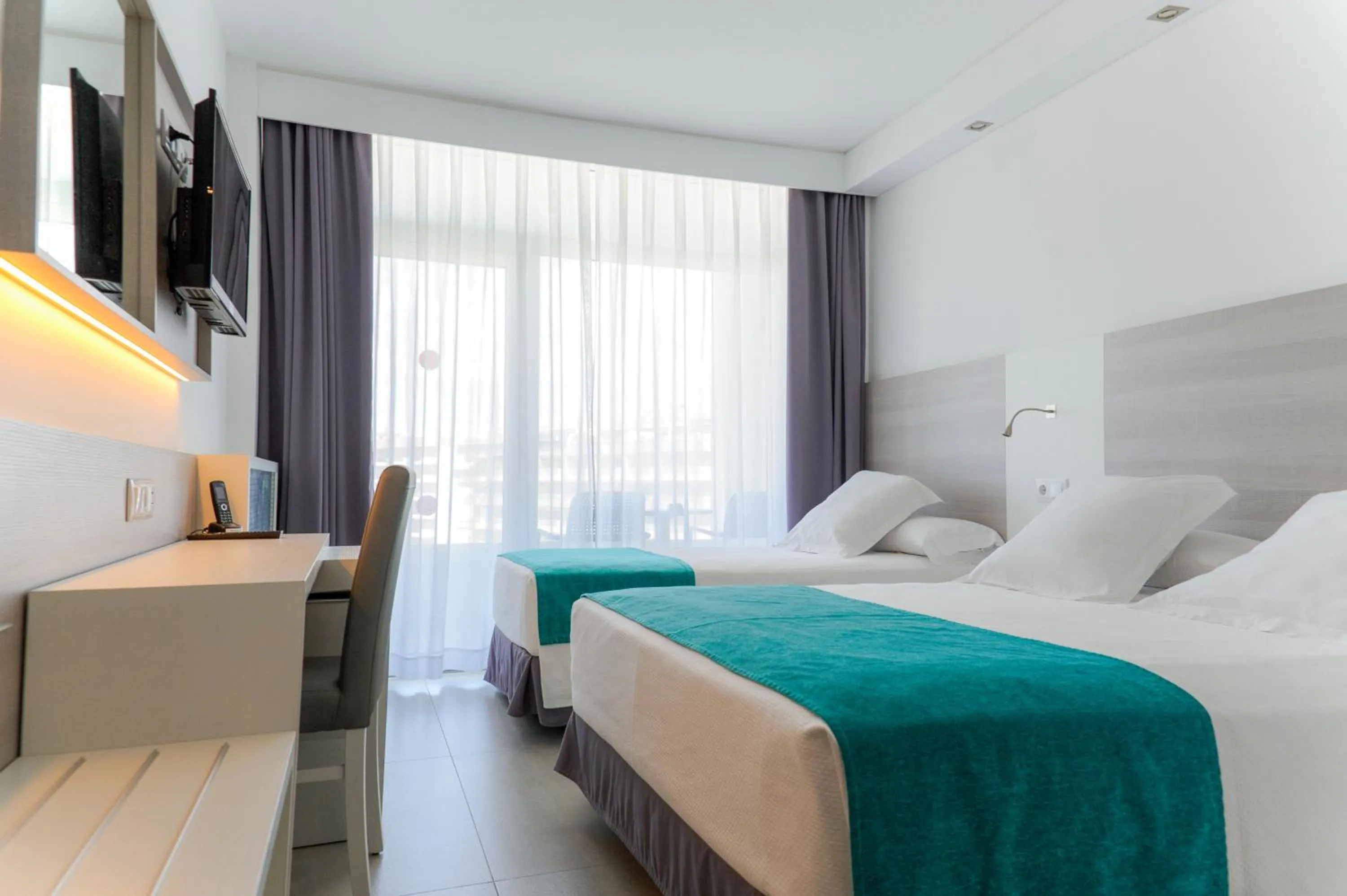 Bed in Hotel Olympus Palace