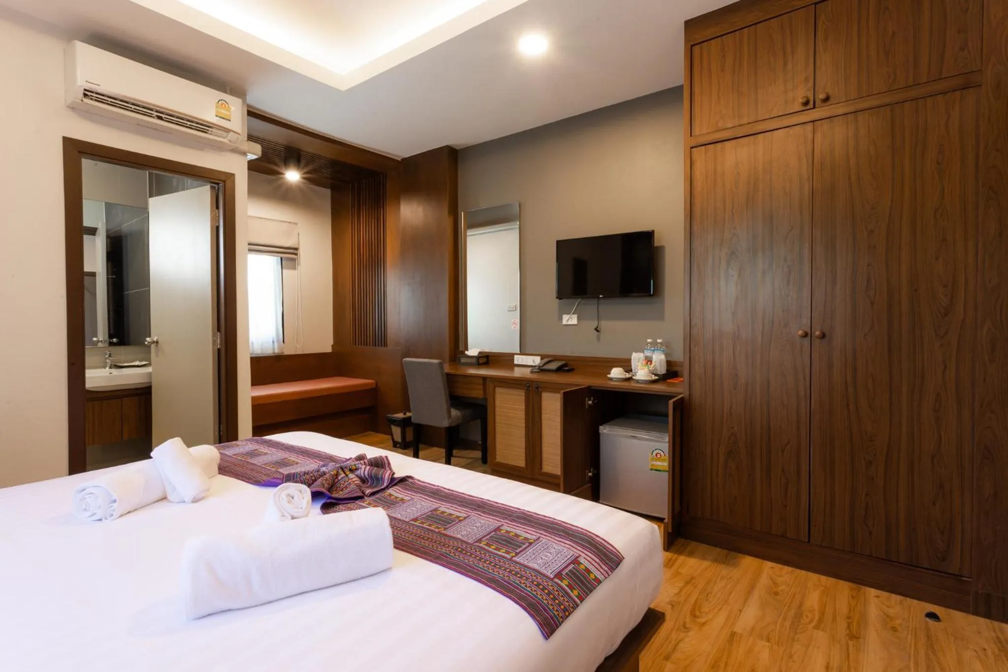 Bed in Lima Lanna Hotel