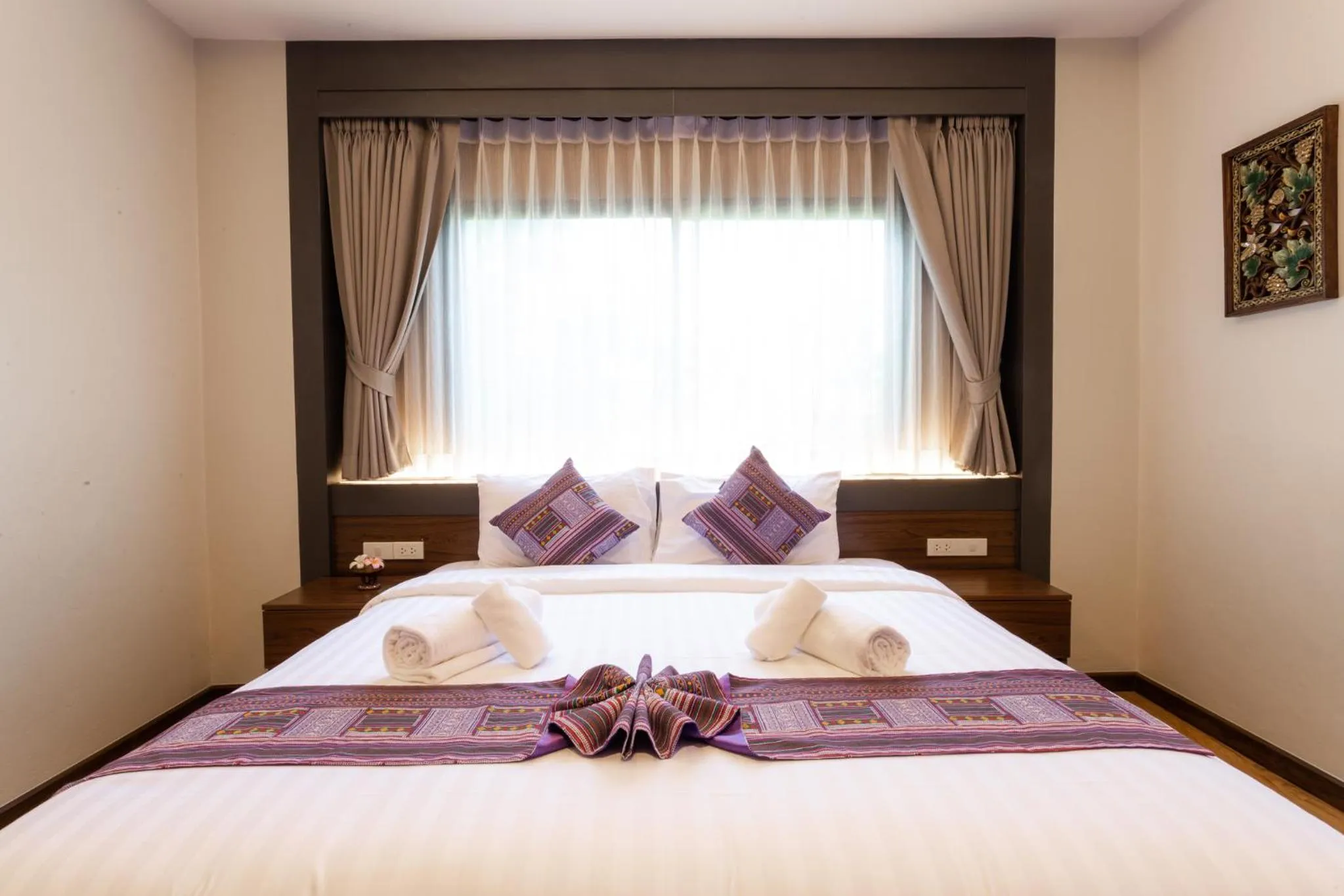 Bed in Lima Lanna Hotel