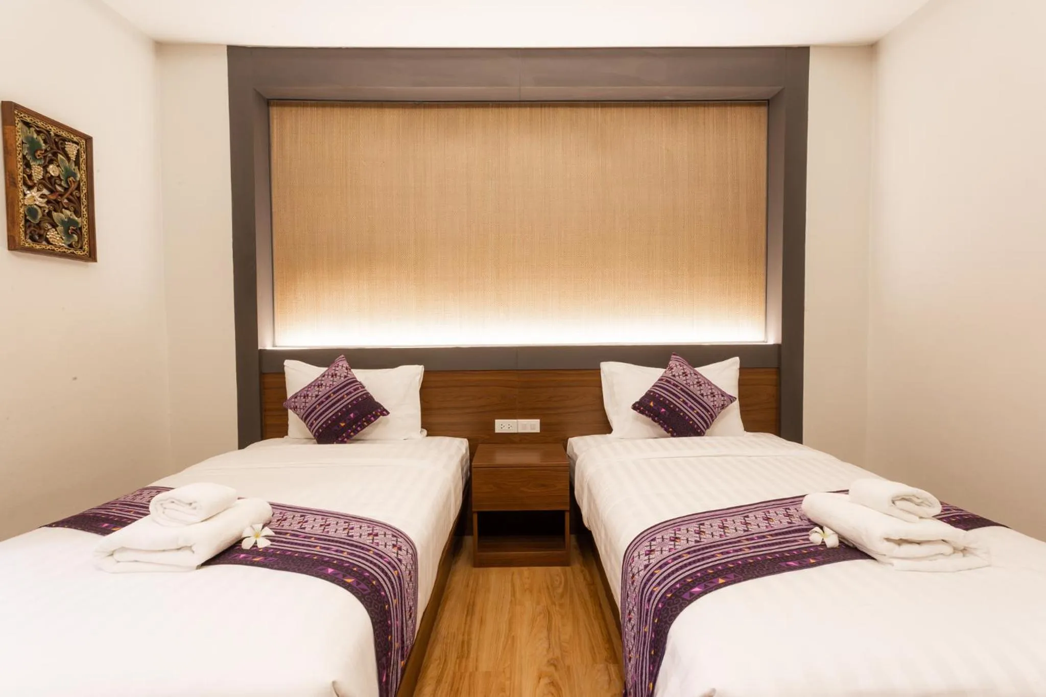 Bed in Lima Lanna Hotel