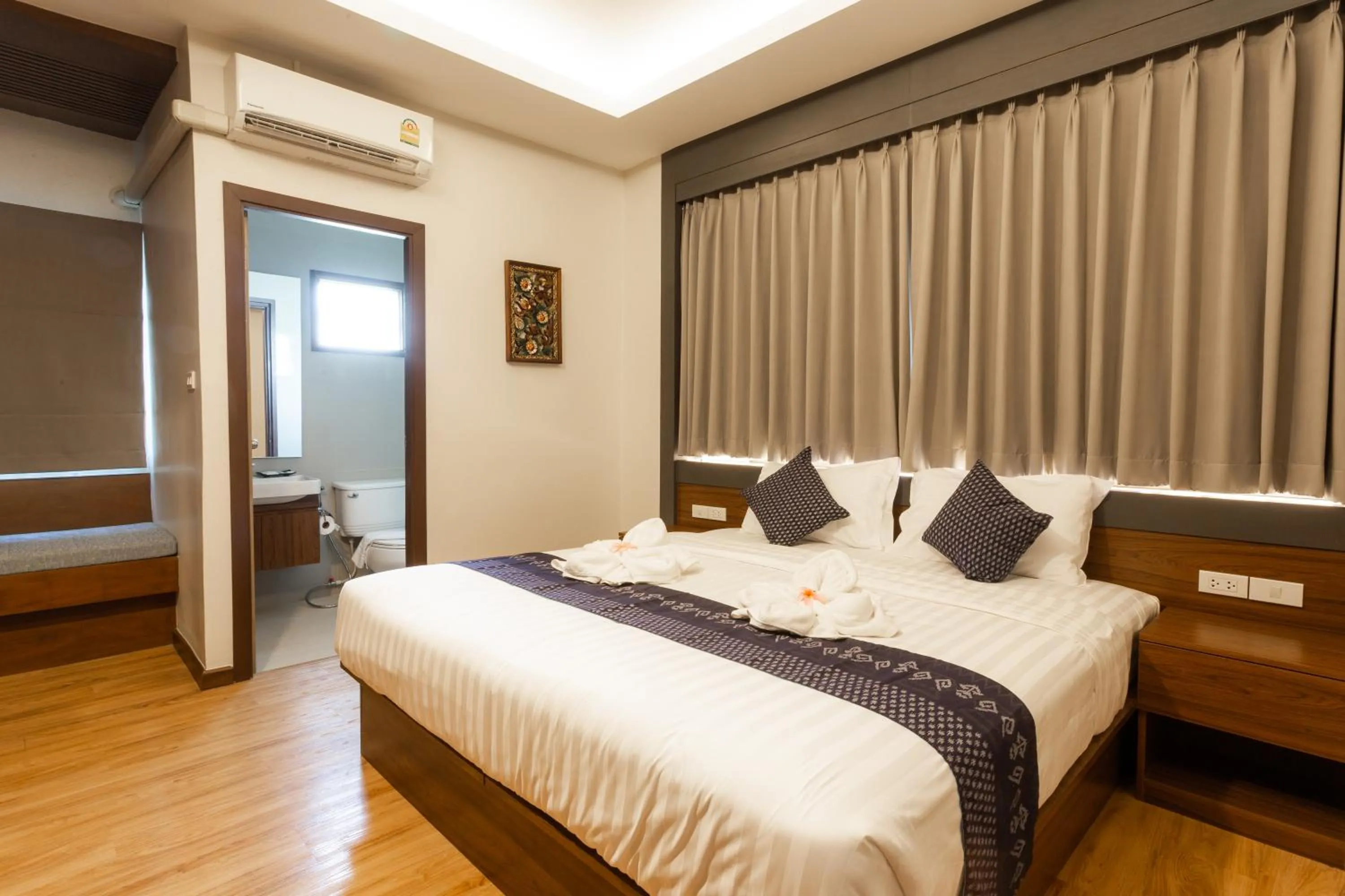 Bed in Lima Lanna Hotel