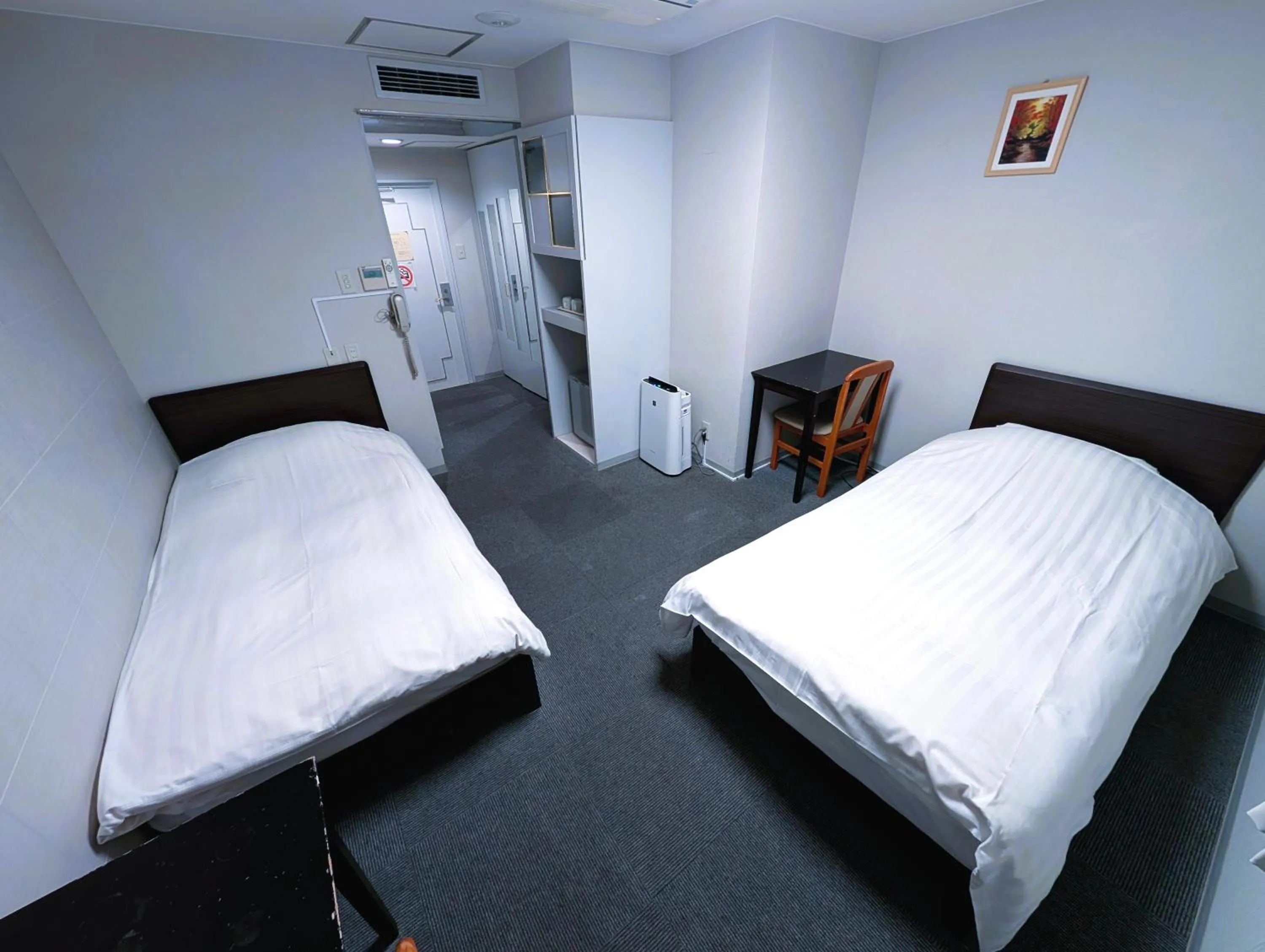 Bed in The Shin-Okubo International Hotel