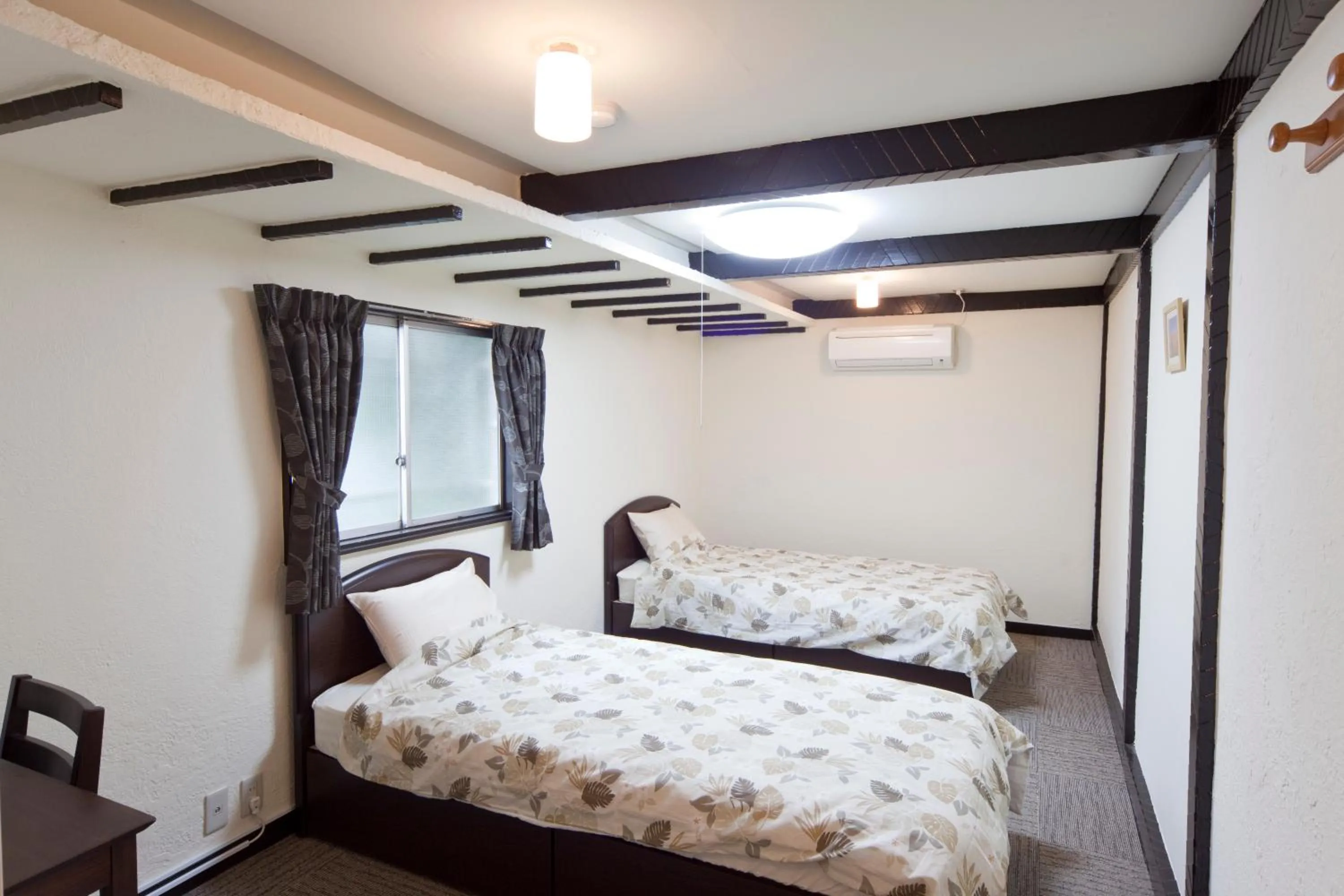 Bed in The Shin-Okubo International Hotel