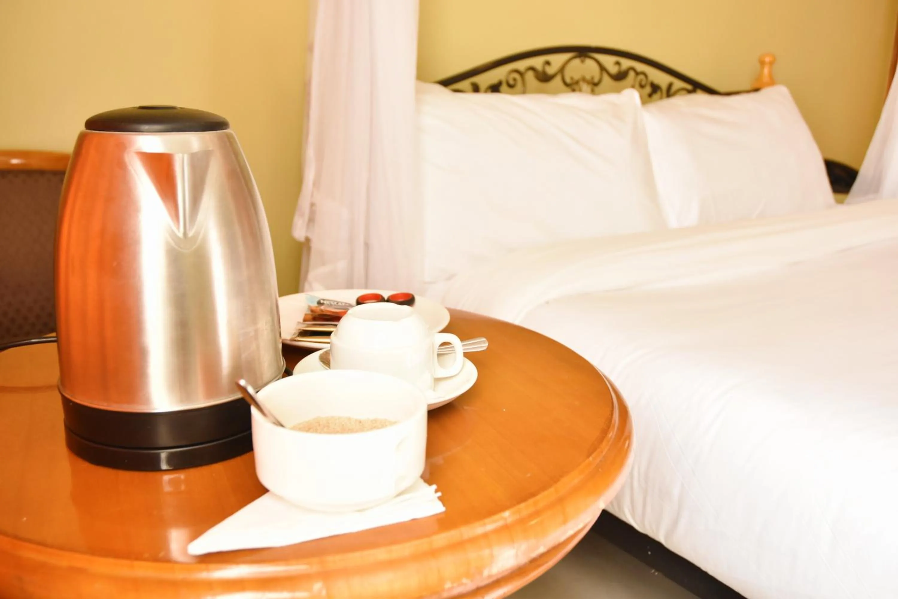 Bedroom, Bed in Wagon Wheel Hotel Eldoret