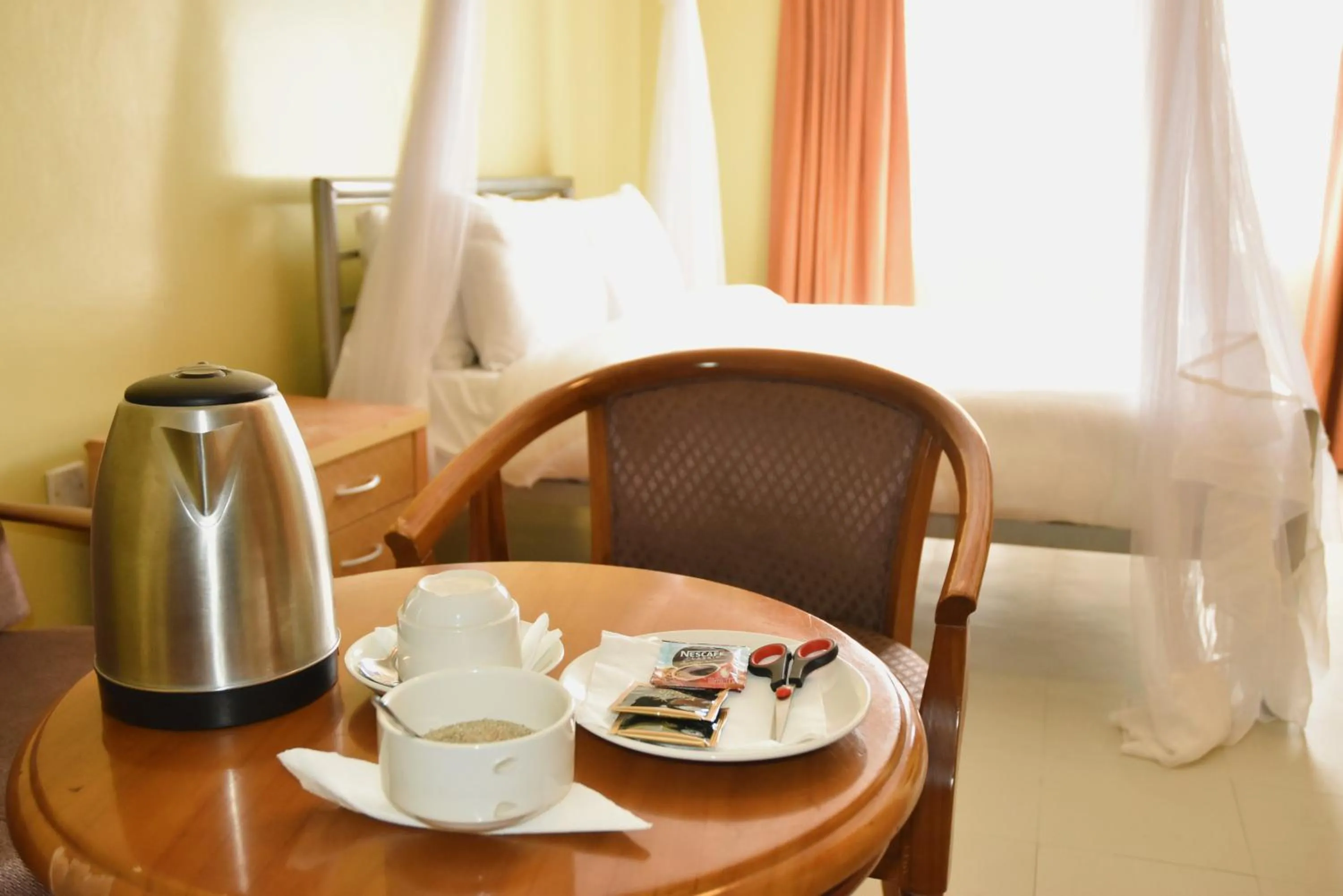 Bedroom, Bed in Wagon Wheel Hotel Eldoret