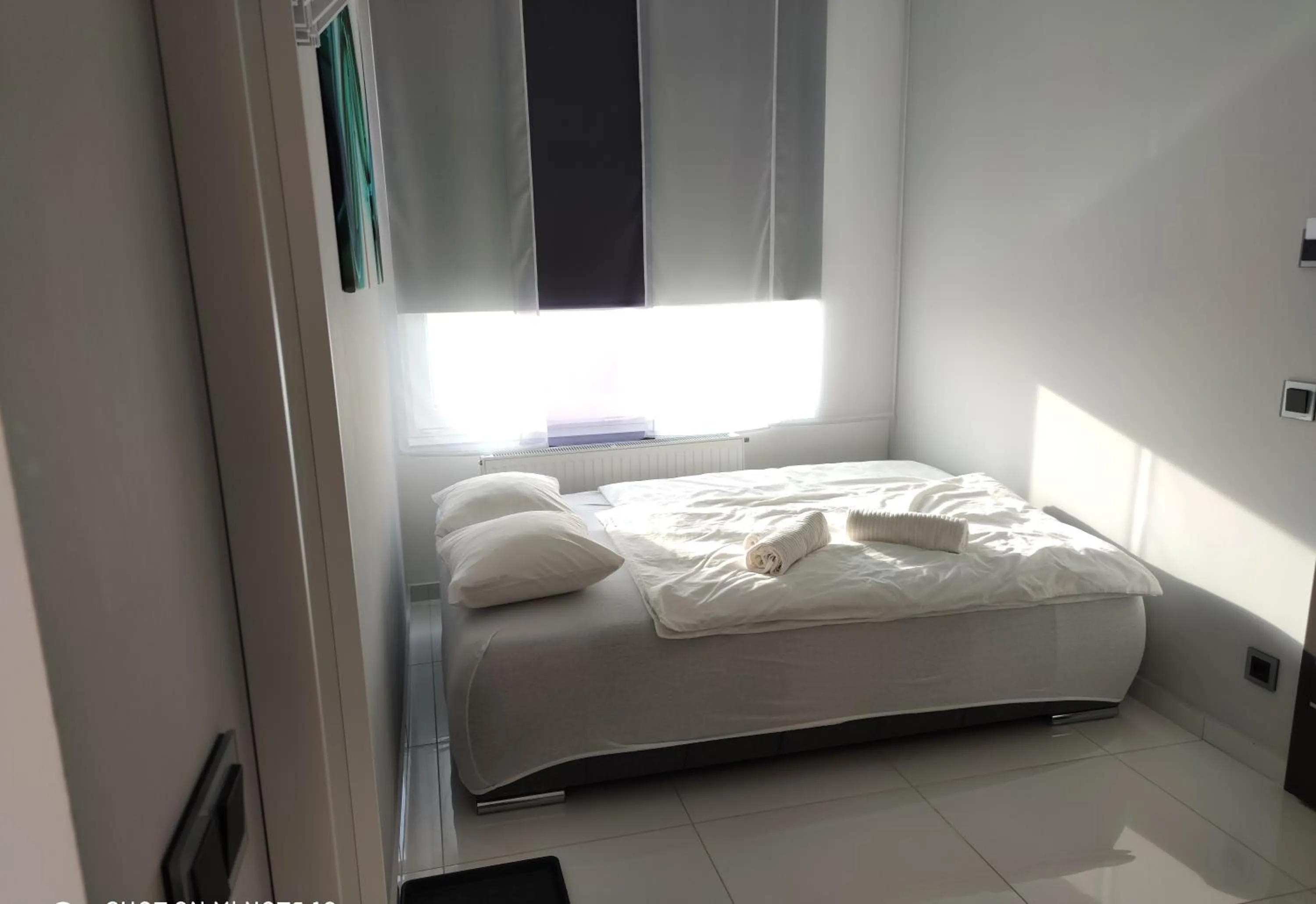 Bed in AQUA SOLAR APARTMANHÁZ