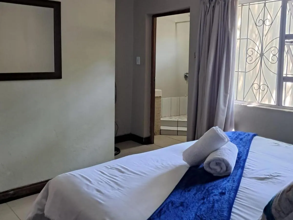 Photo of the whole room, Bed in SeaXplore Lodge & Dive Center