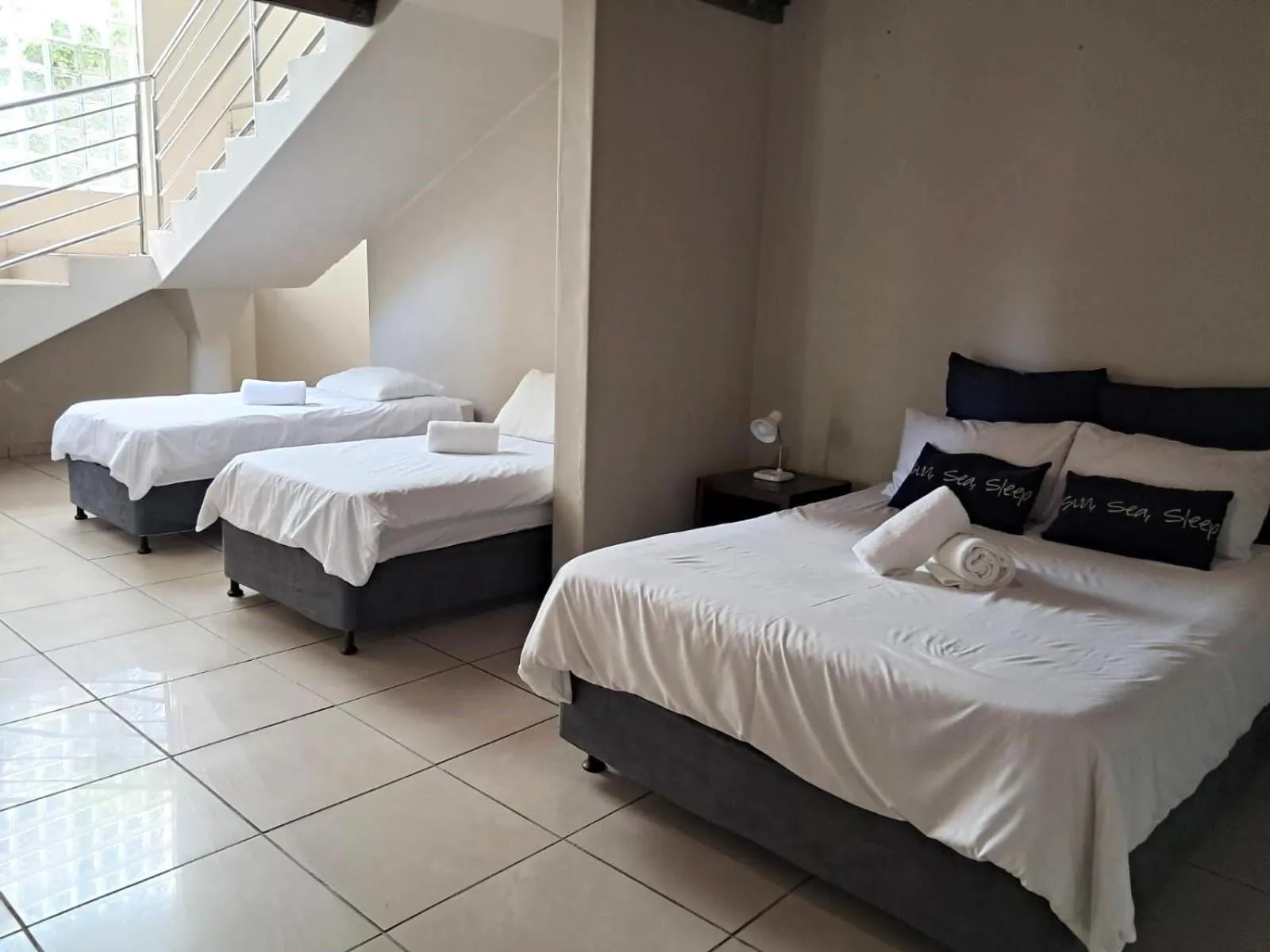 Photo of the whole room, Bed in SeaXplore Lodge & Dive Center