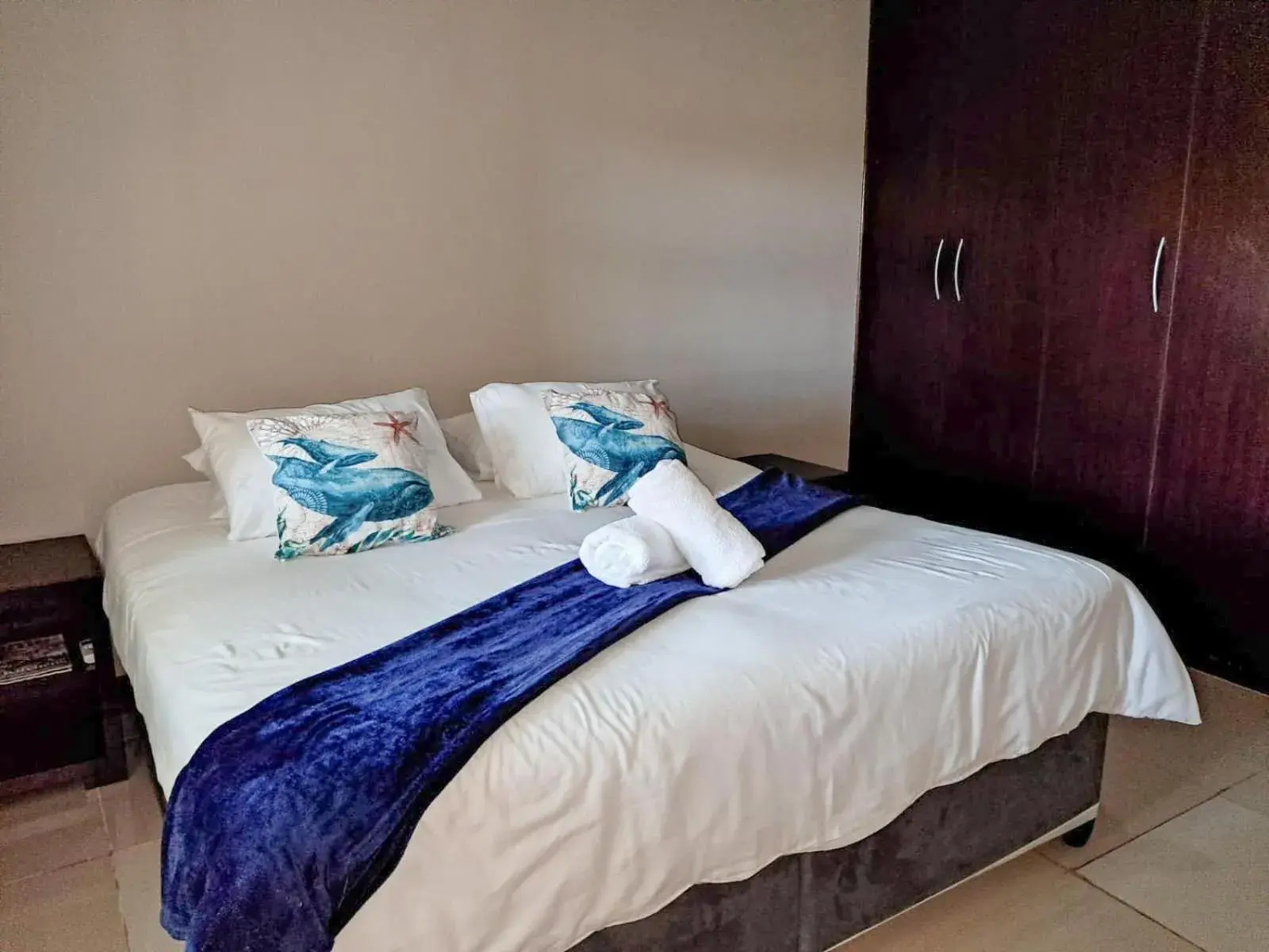 Bed in SeaXplore Lodge & Dive Center Bed in SeaXplore Lodge & Dive Center