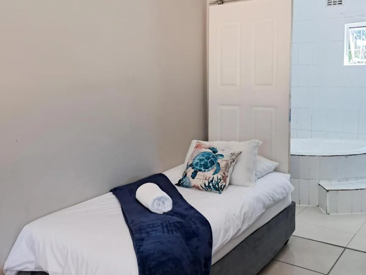 Bed in SeaXplore Lodge & Dive Center