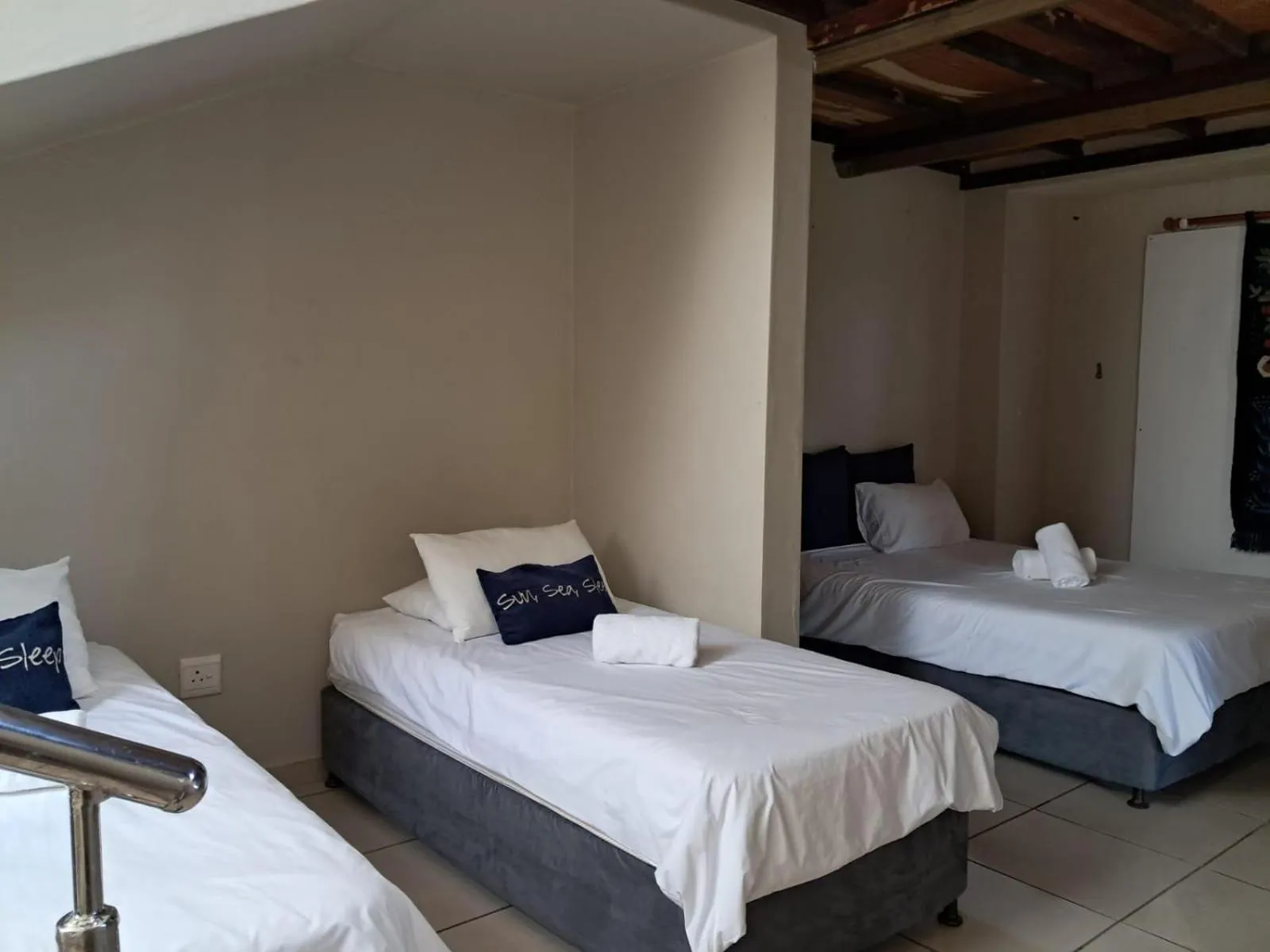 Photo of the whole room, Bed in SeaXplore Lodge & Dive Center