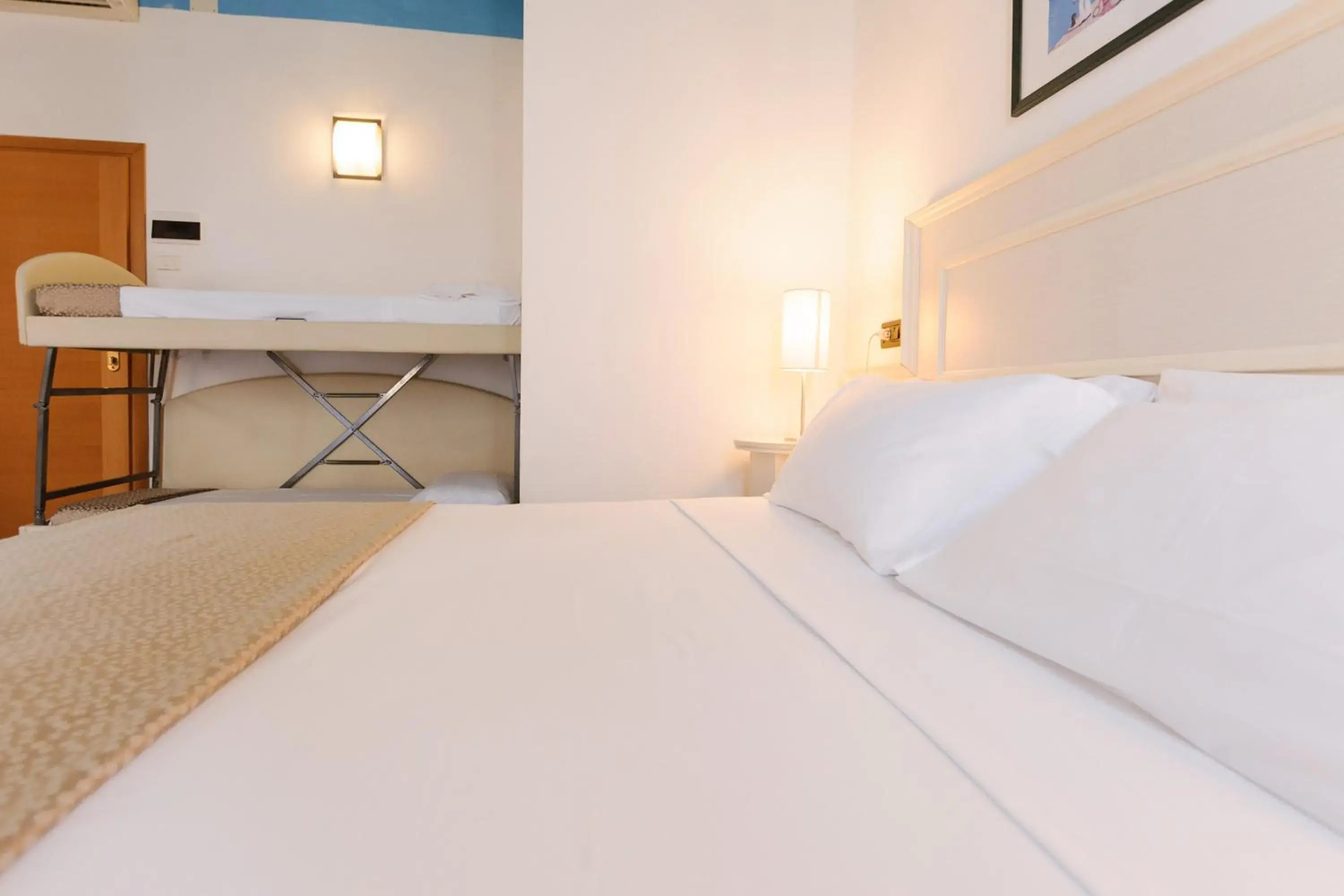 Bed in Hotel Fra I Pini Bed in Hotel Fra I Pini