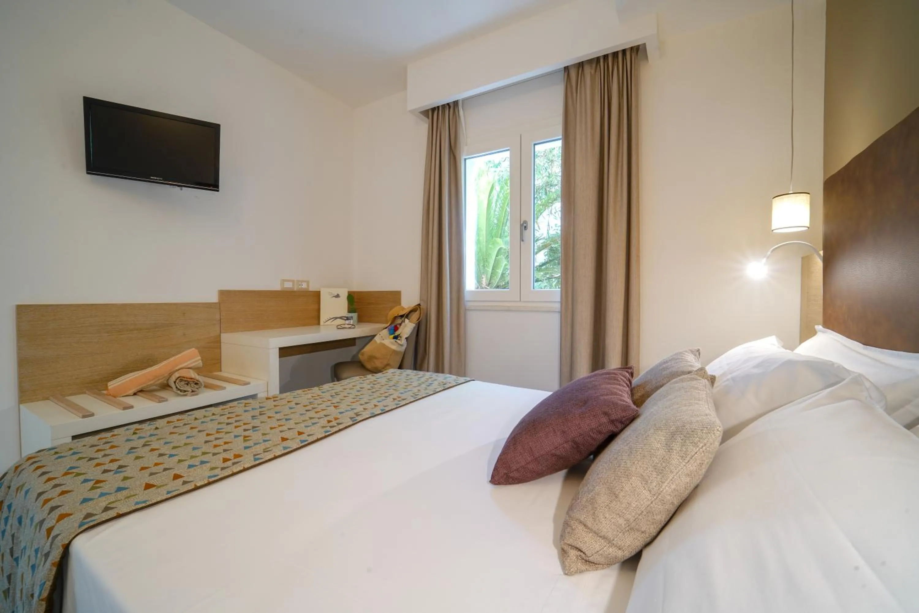 Bed in Baia del Godano Resort & Spa