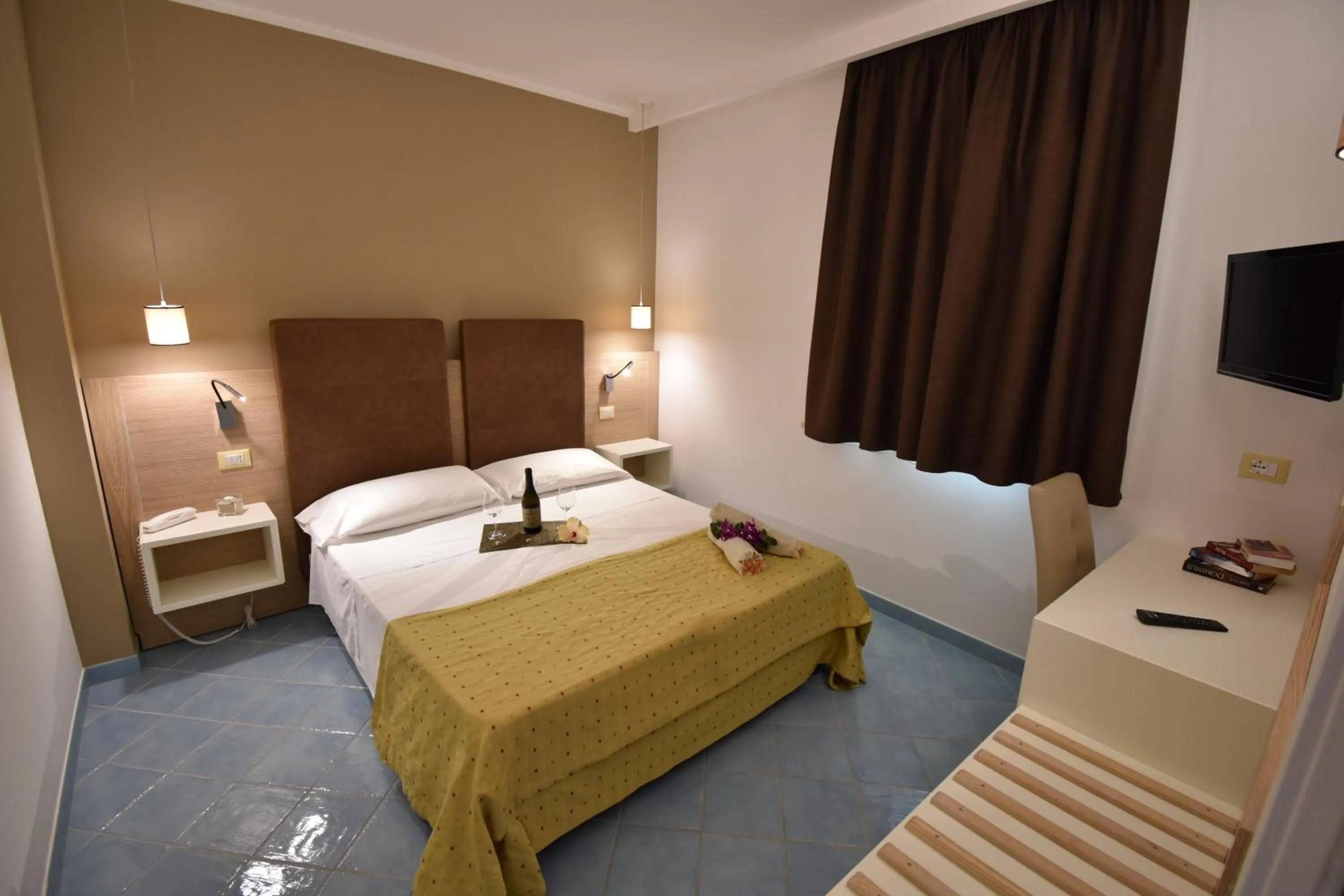 Bedroom, Bed in Baia del Godano Resort & Spa