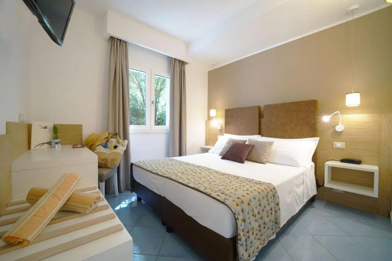 Bed in Baia del Godano Resort & Spa