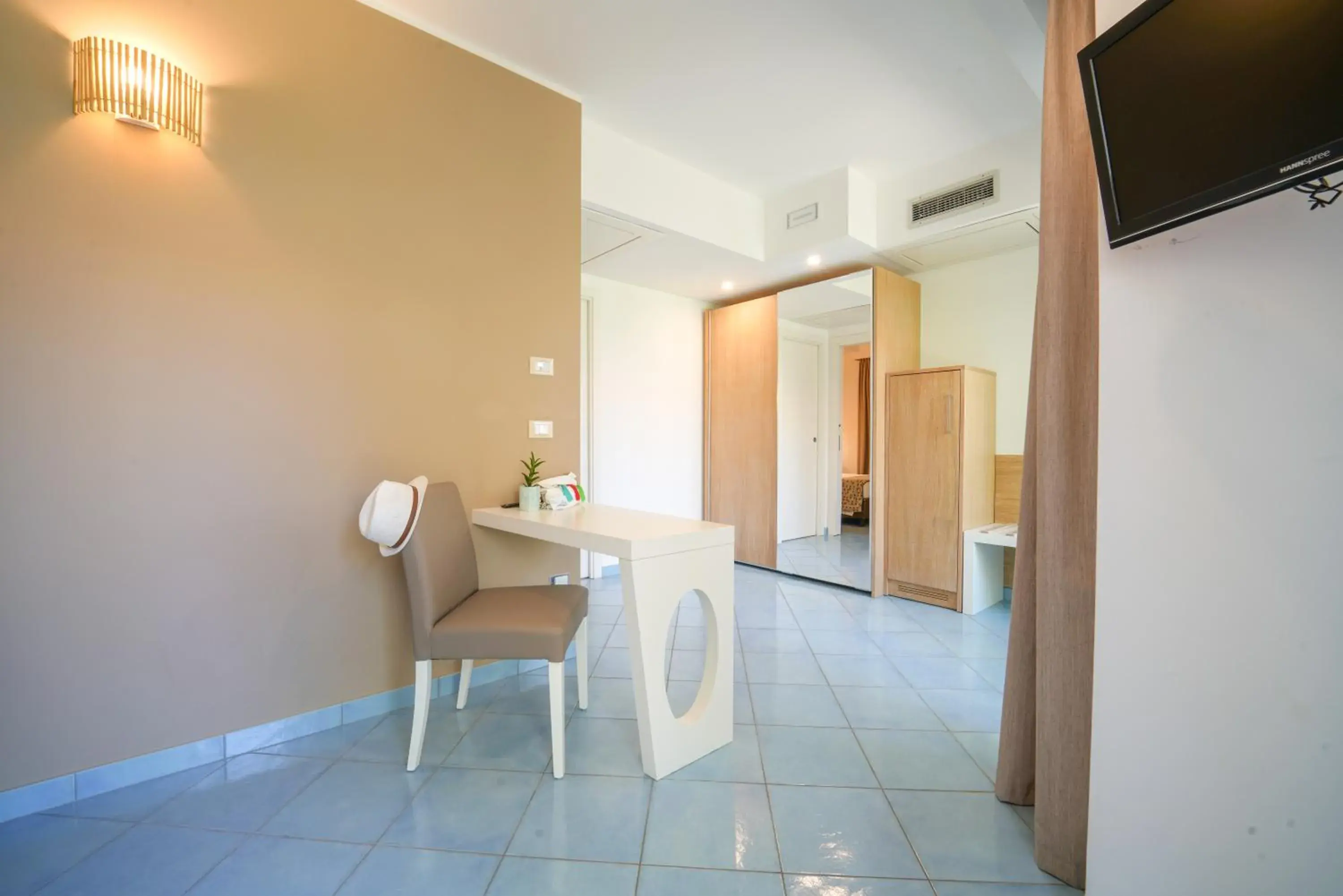 Bed in Baia del Godano Resort & Spa Bed in Baia del Godano Resort & Spa