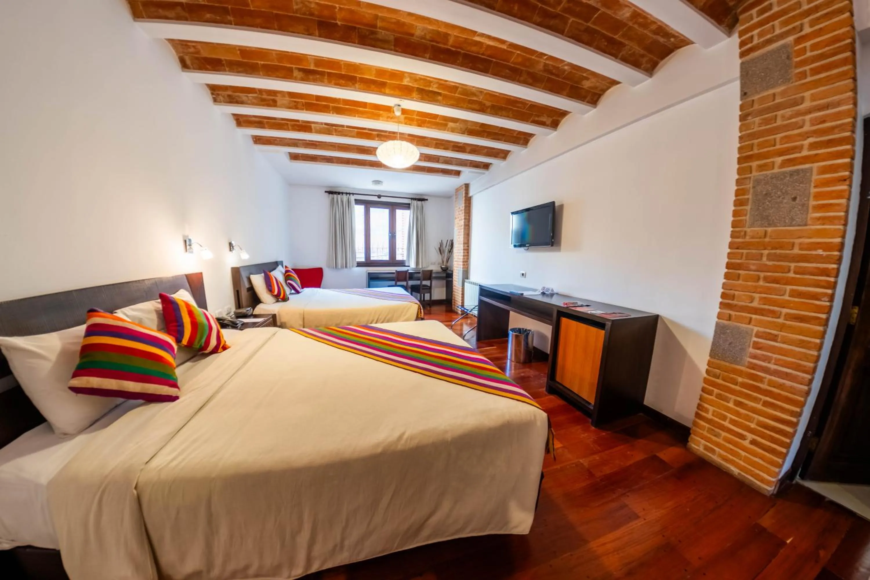Bed in La Casona Hotel Boutique