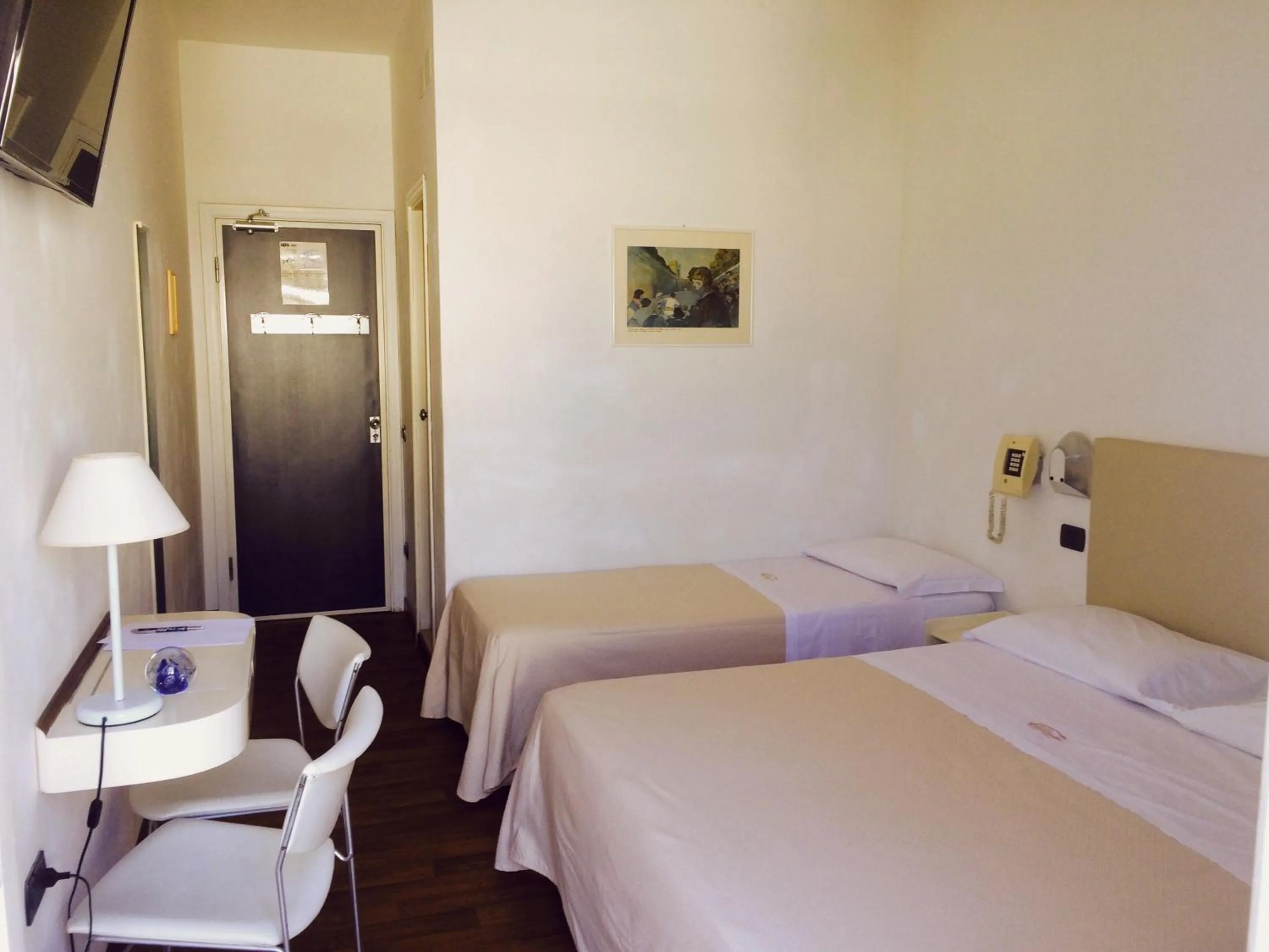 Bed in Hotel Nettuno