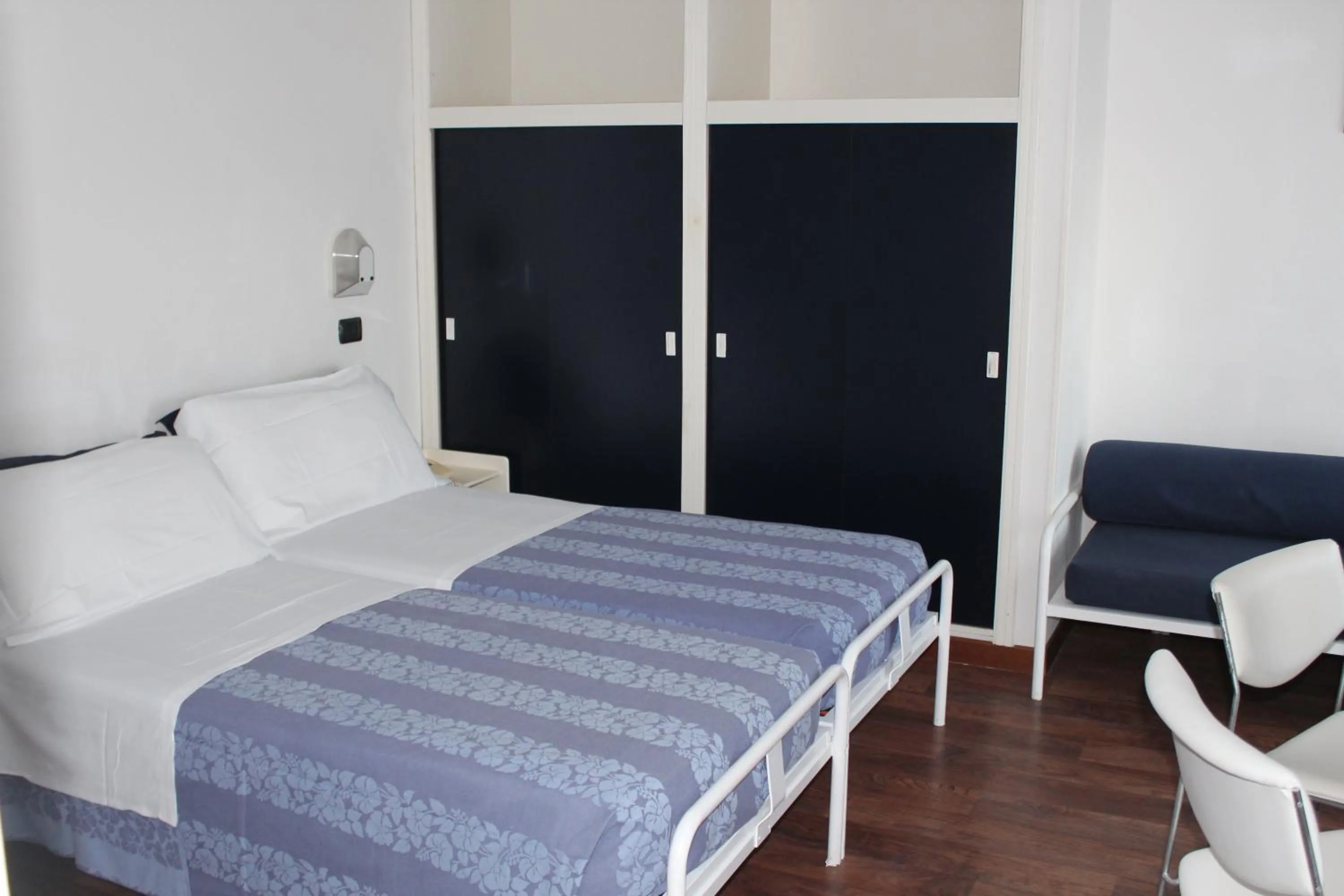 Bed in Hotel Nettuno