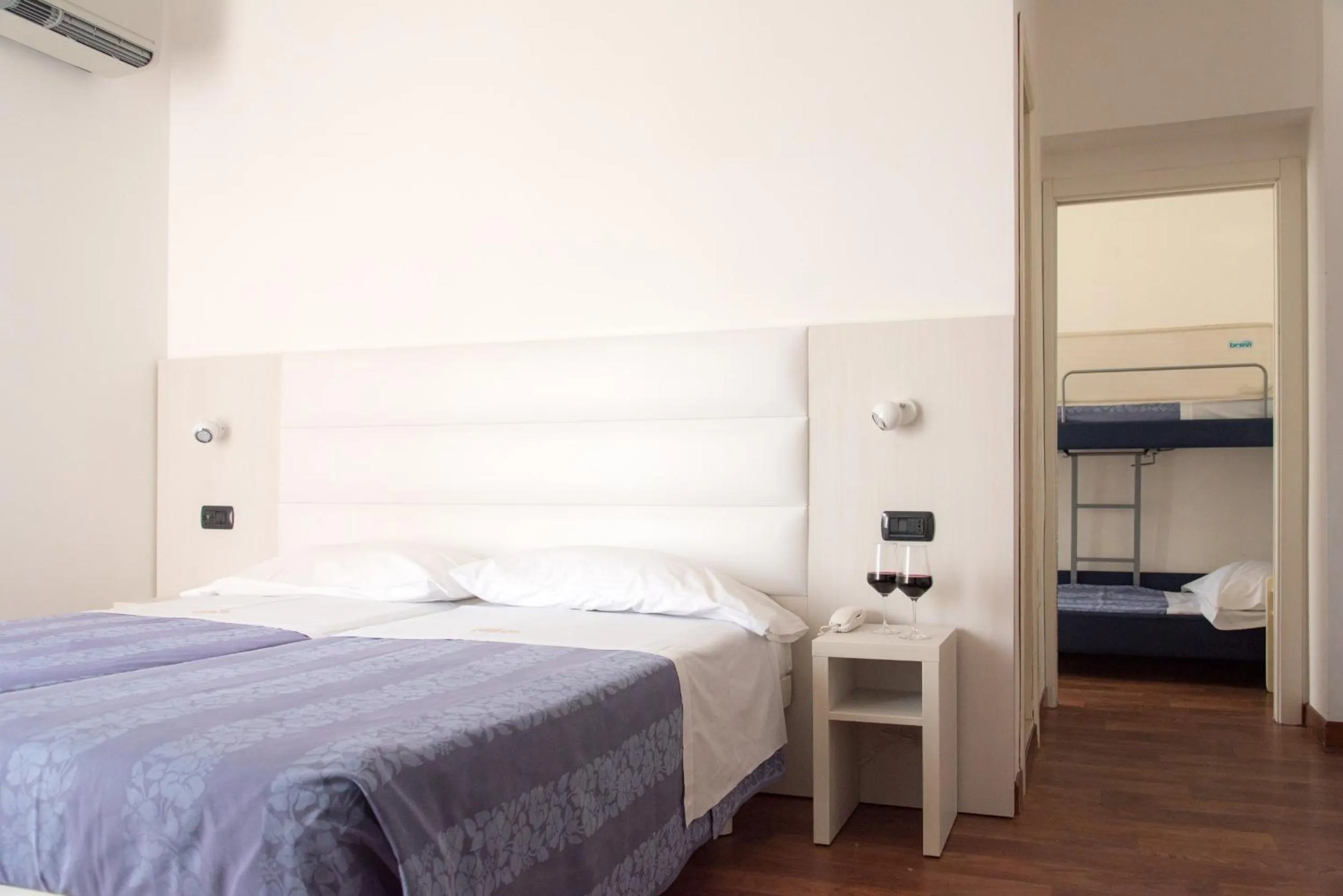 Bed in Hotel Nettuno