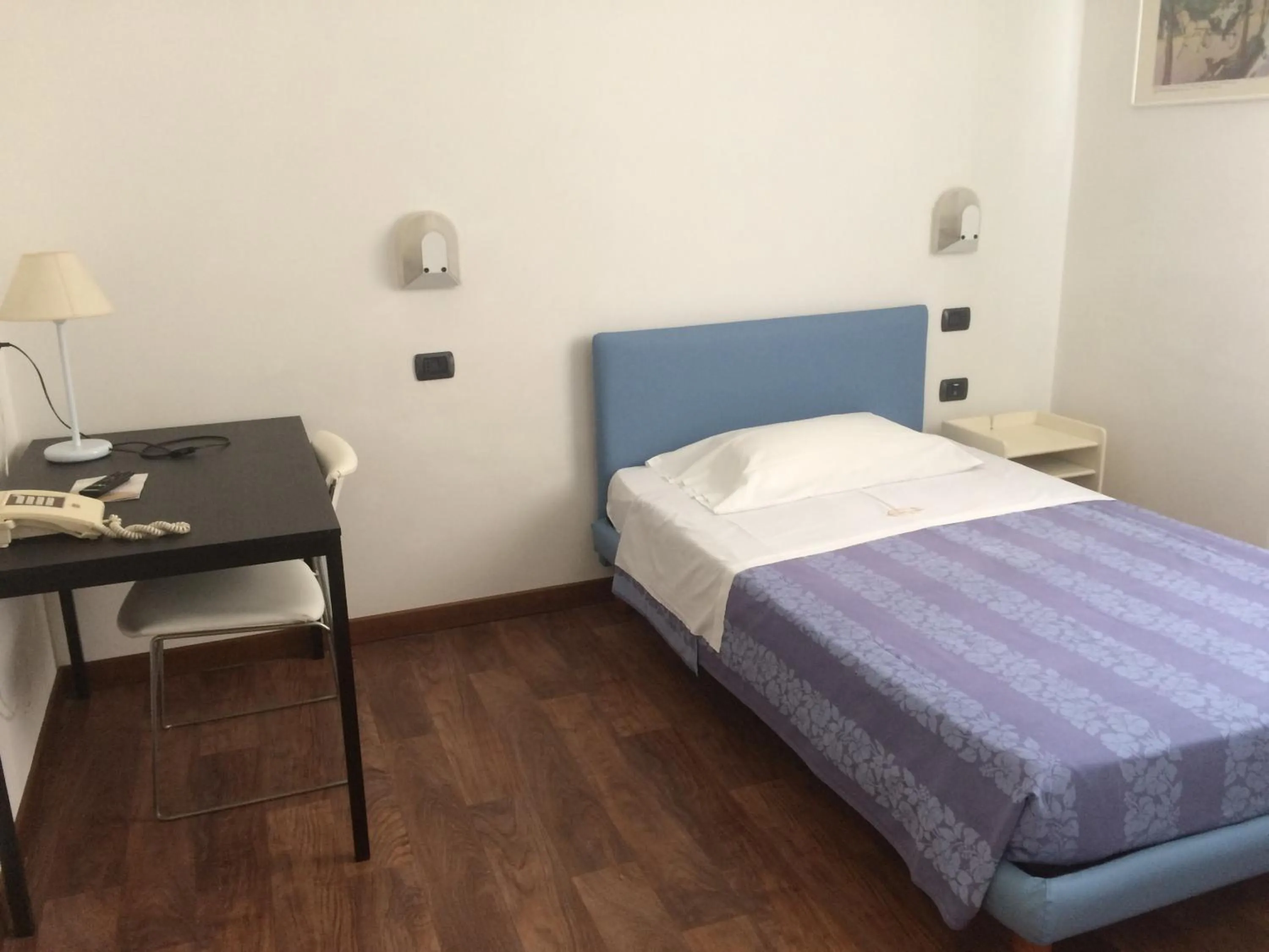 Bed in Hotel Nettuno