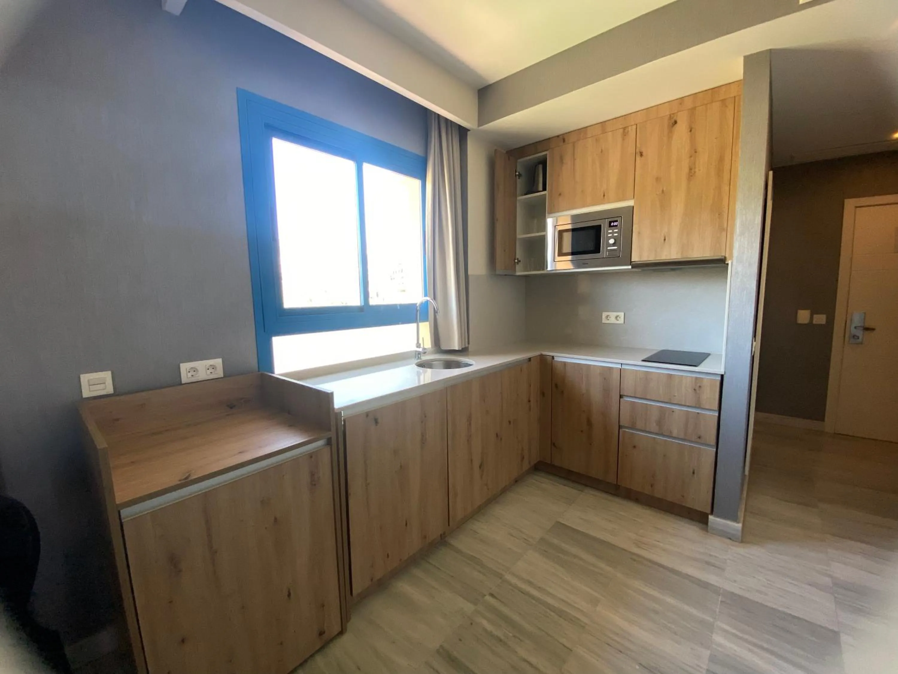 Kitchen or kitchenette in HYDROS Hotel & Spa