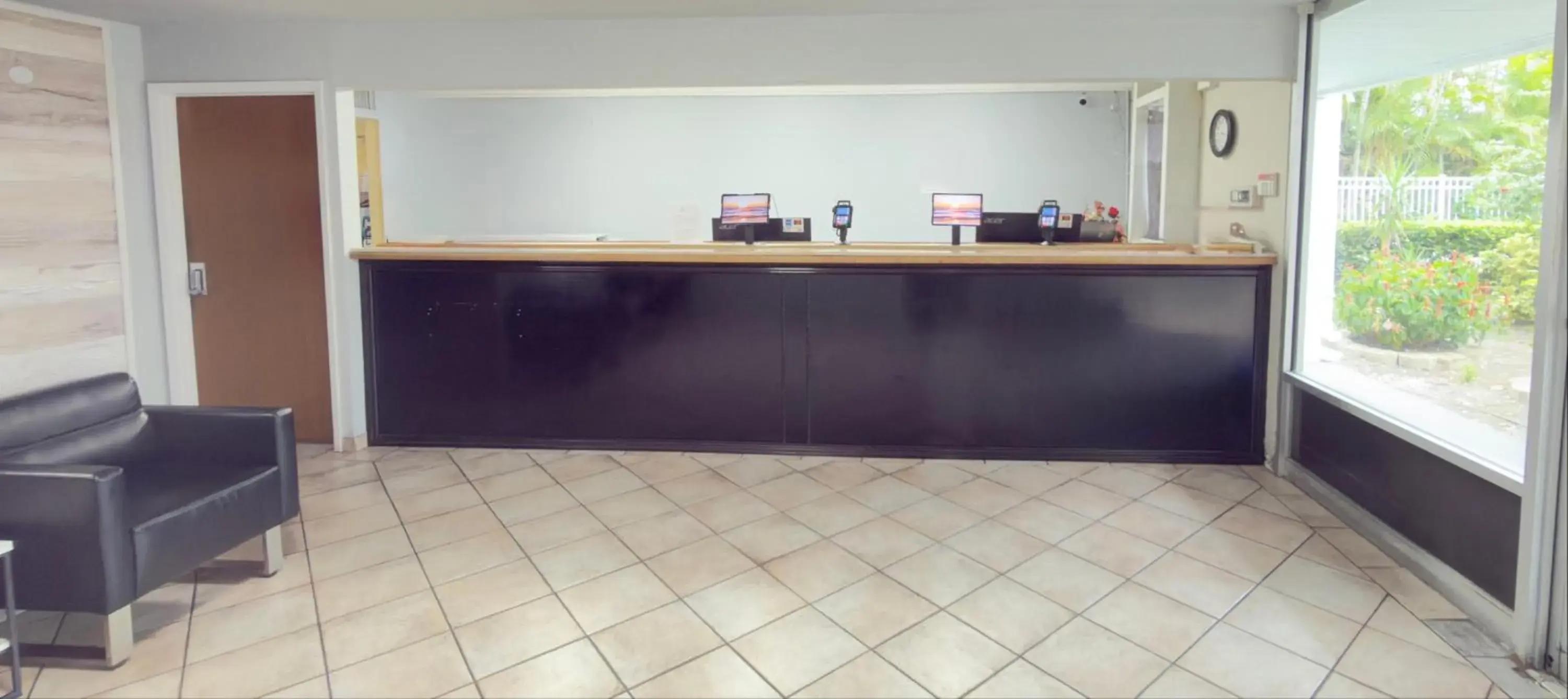 Lobby or reception in Lantern Inn & Suites - Sarasota Lobby or reception in Lantern Inn & Suites - Sarasota