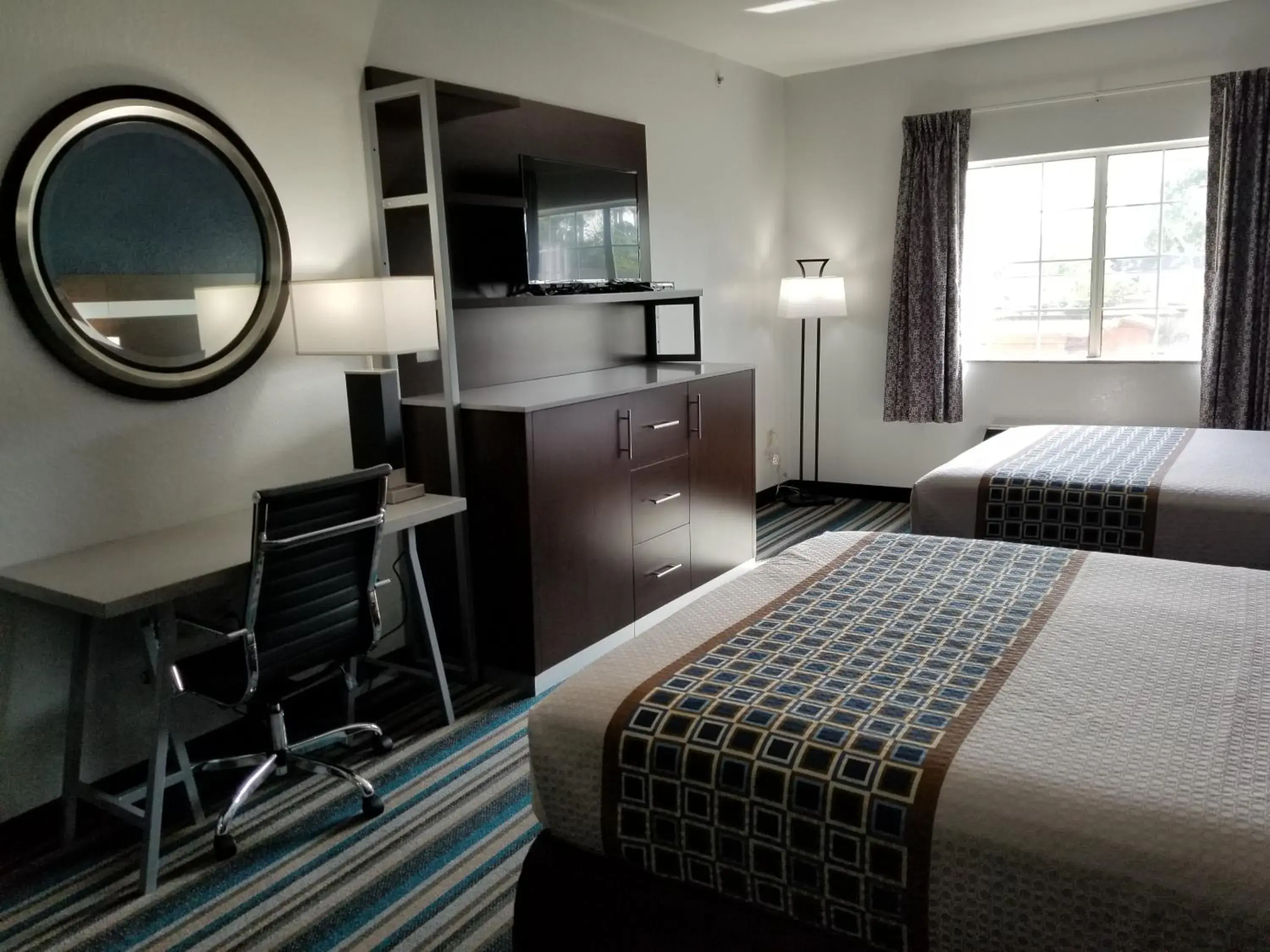 Bed in HomeBridge Inn and Suites Bed in HomeBridge Inn and Suites