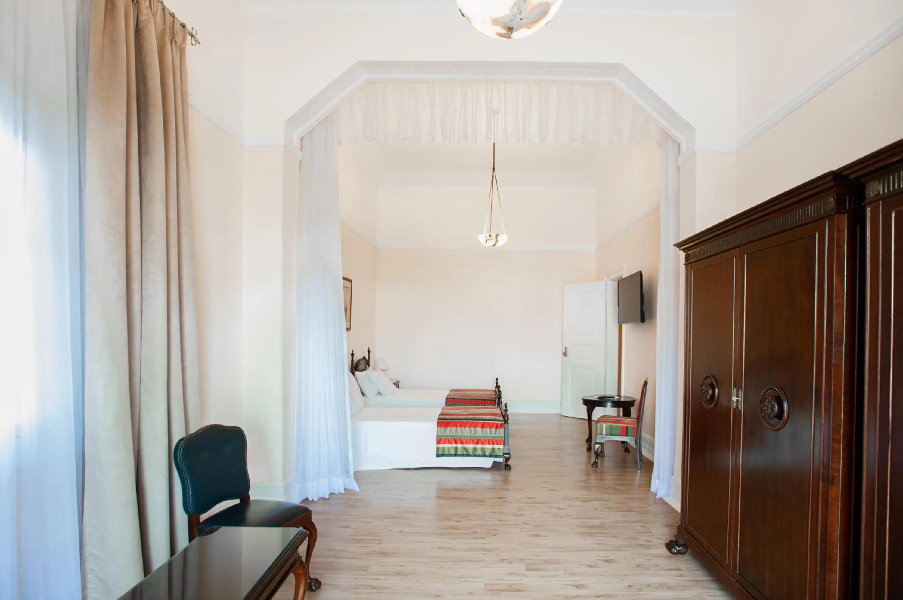 Living room, Bed in Palace Hotel - Poços de Caldas