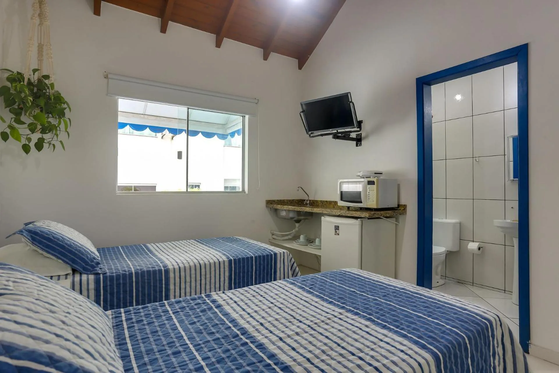 Bed in Pousada Canario Azul