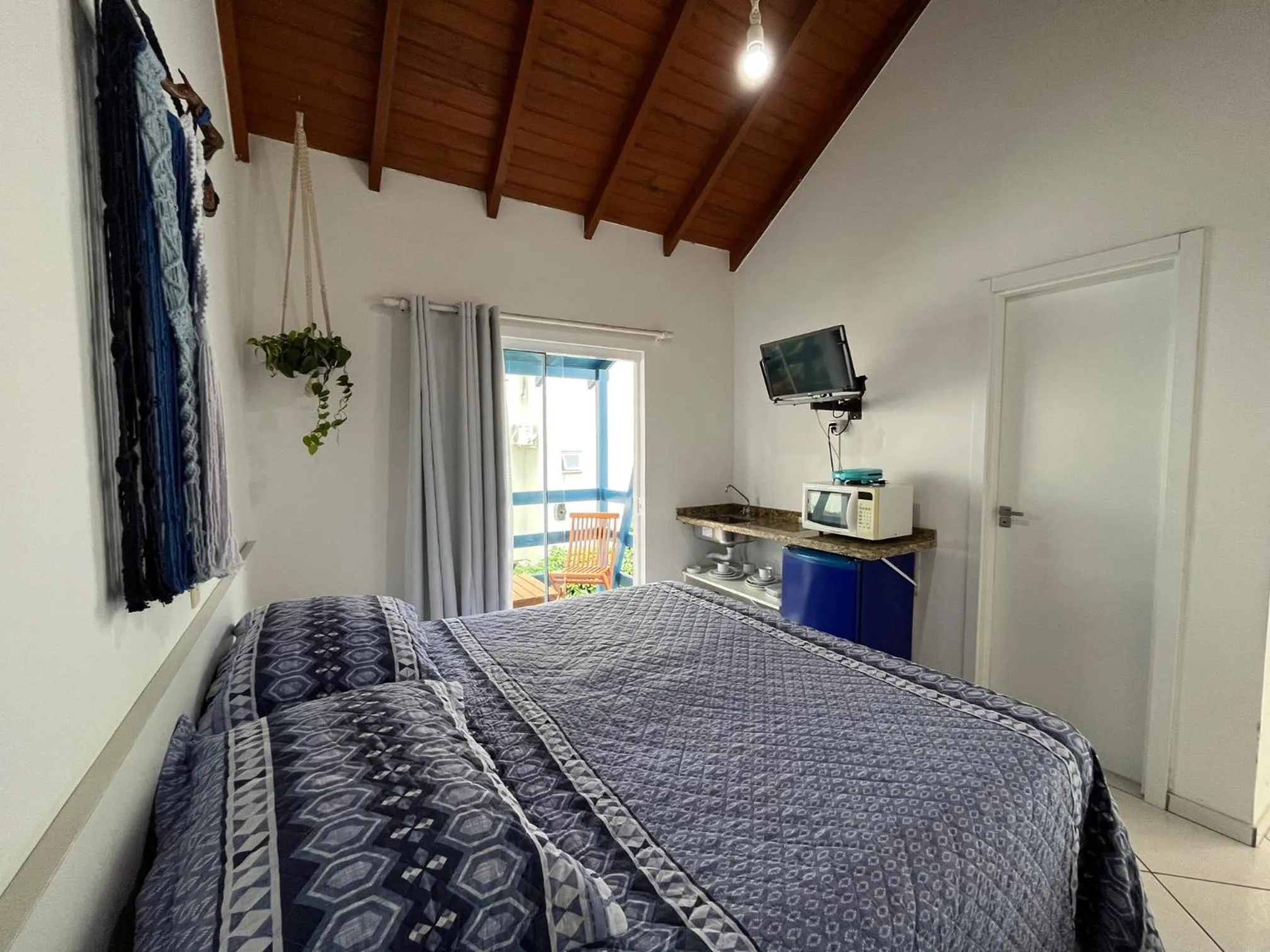 Bed in Pousada Canario Azul