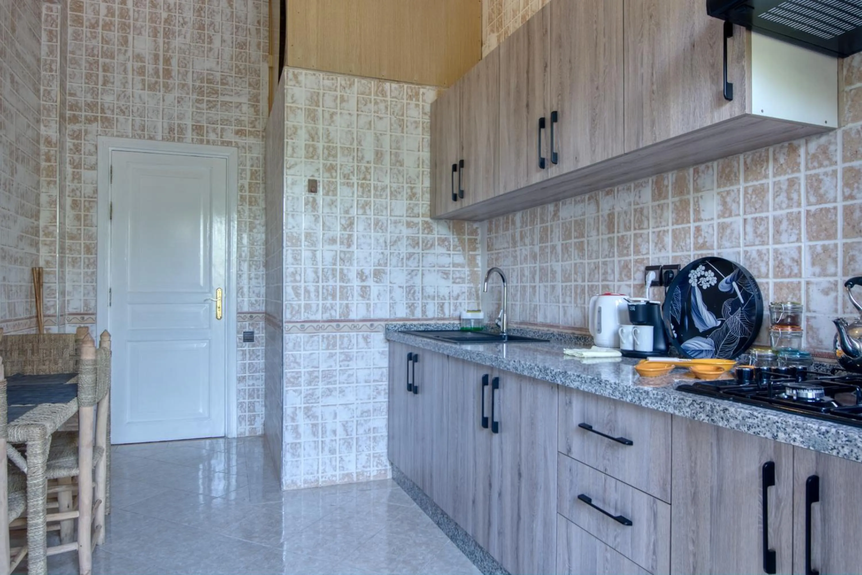 Kitchen or kitchenette in Villas 95 Appart'Hôtel