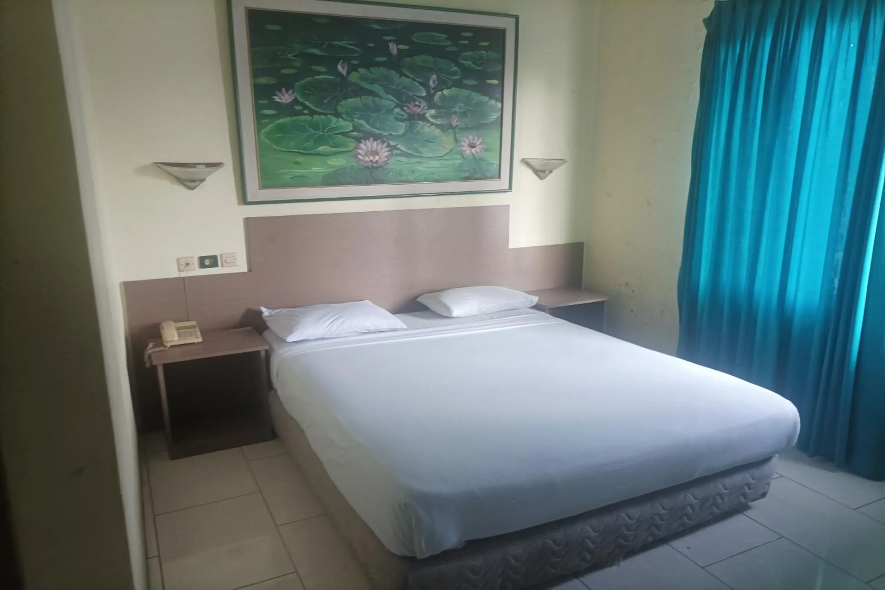 Economy Double Room in Permata Hijau Economy Double Room in Permata Hijau