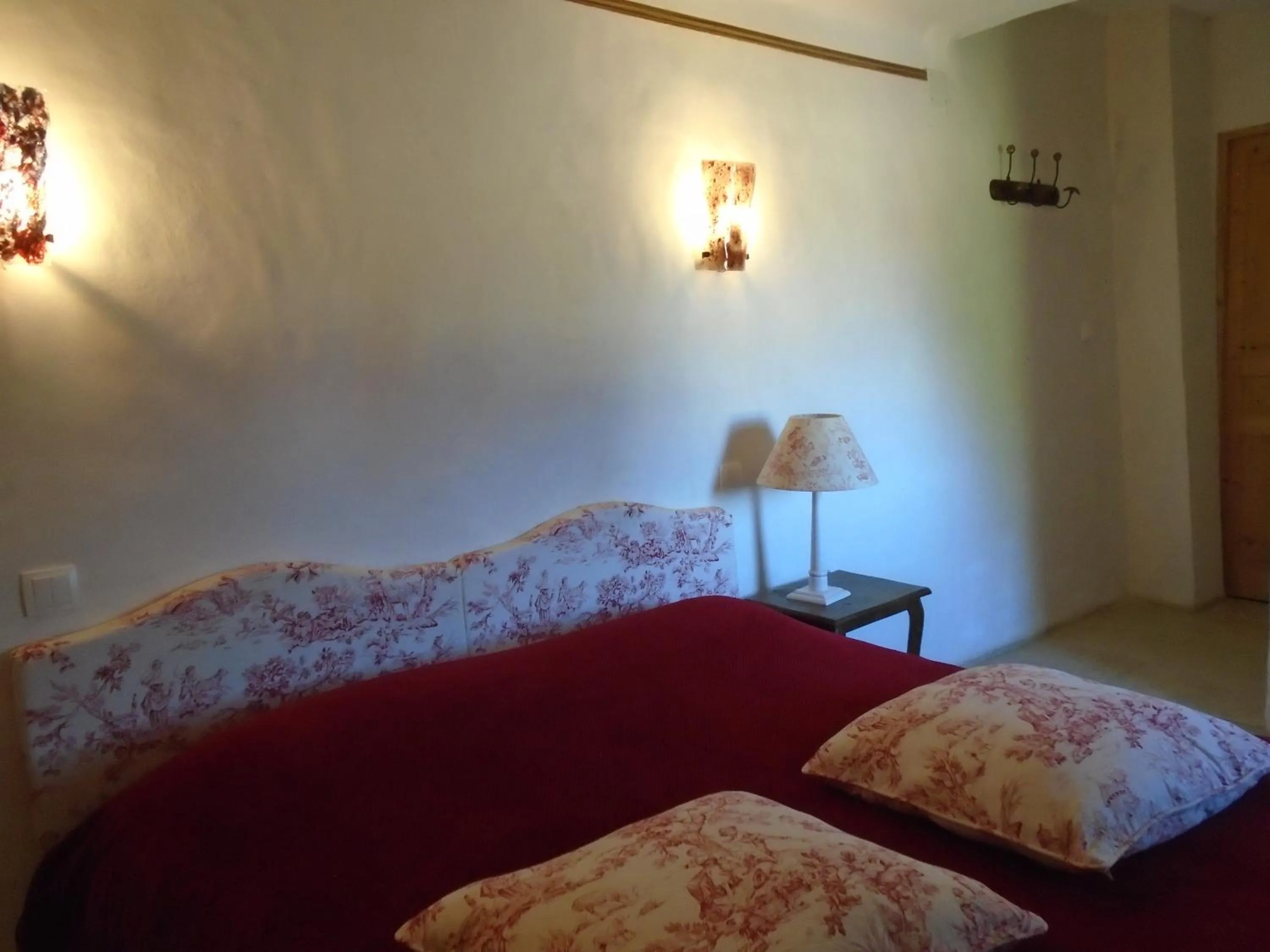 Bedroom, Bed in Chambres & Tables d'hôtes Moulin de Lavon