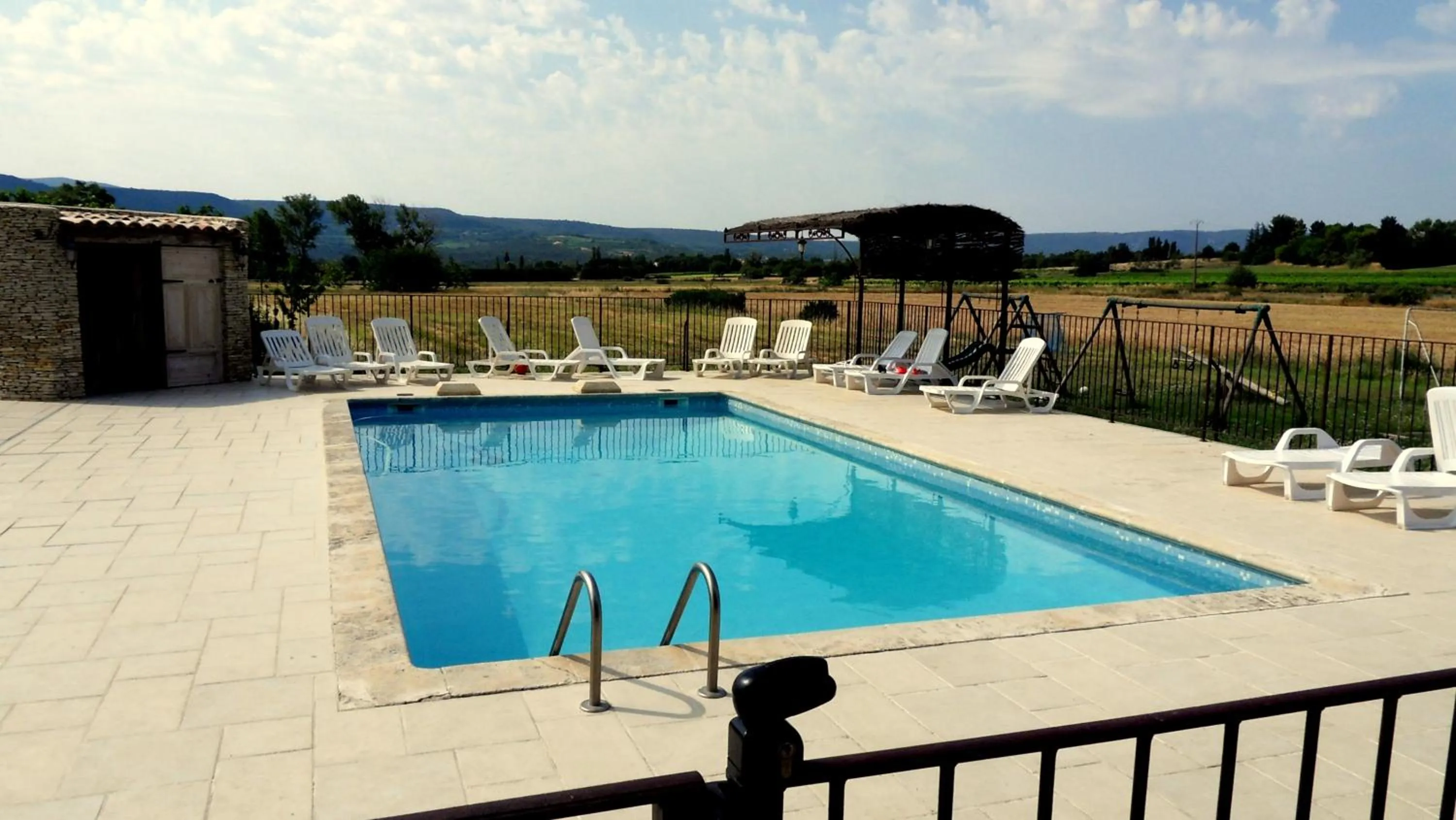Swimming pool in Chambres & Tables d'hôtes Moulin de Lavon