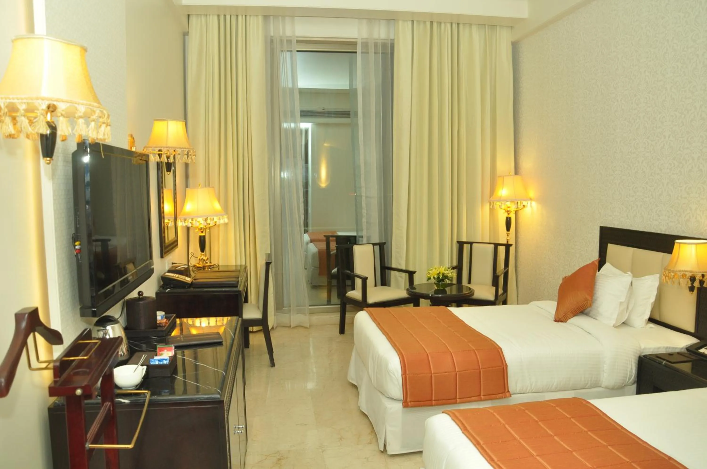 Photo of the whole room, Bed in Royal Tulip Navi Mumbai