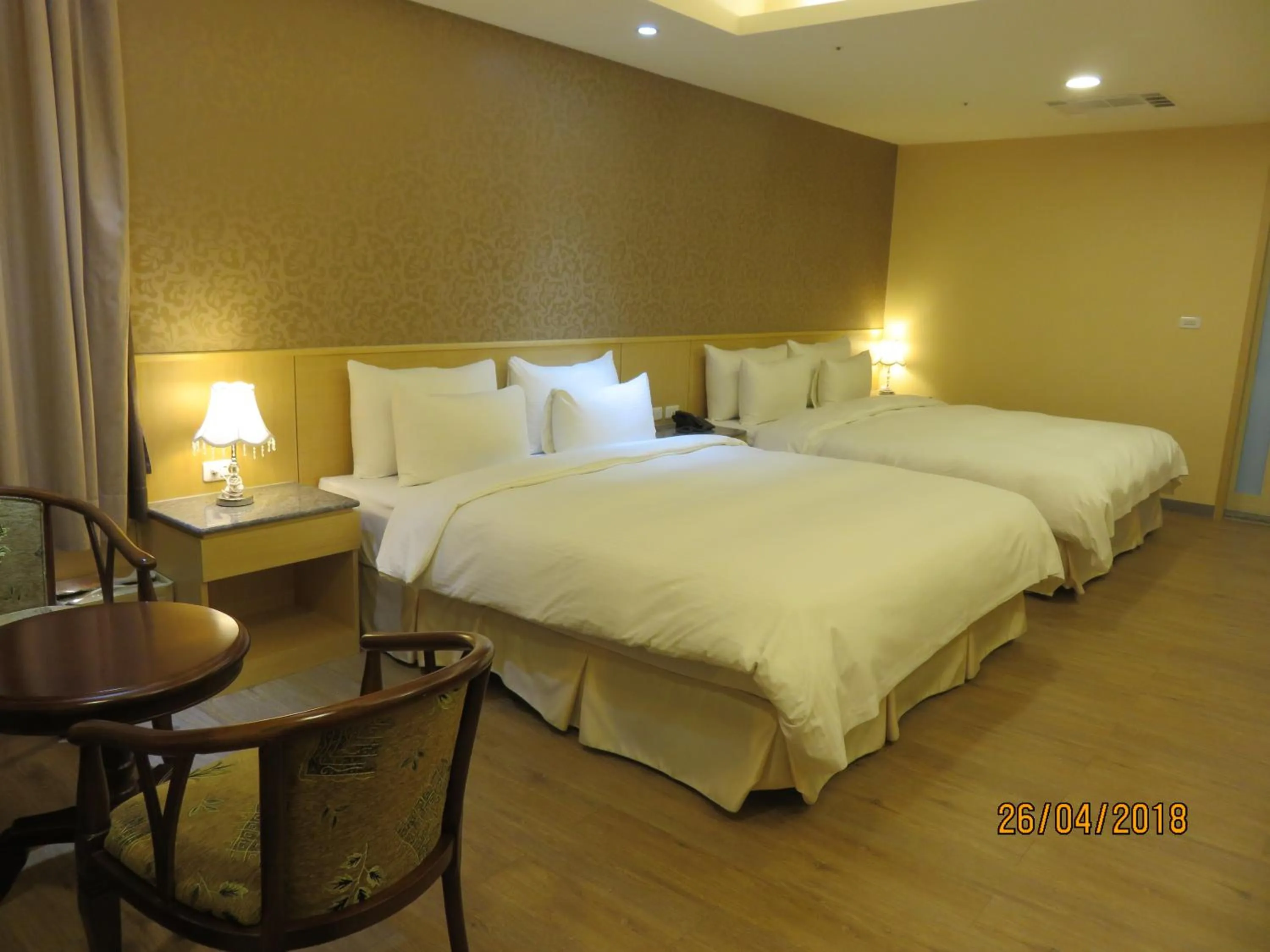 Bed in Mao Hua Motel