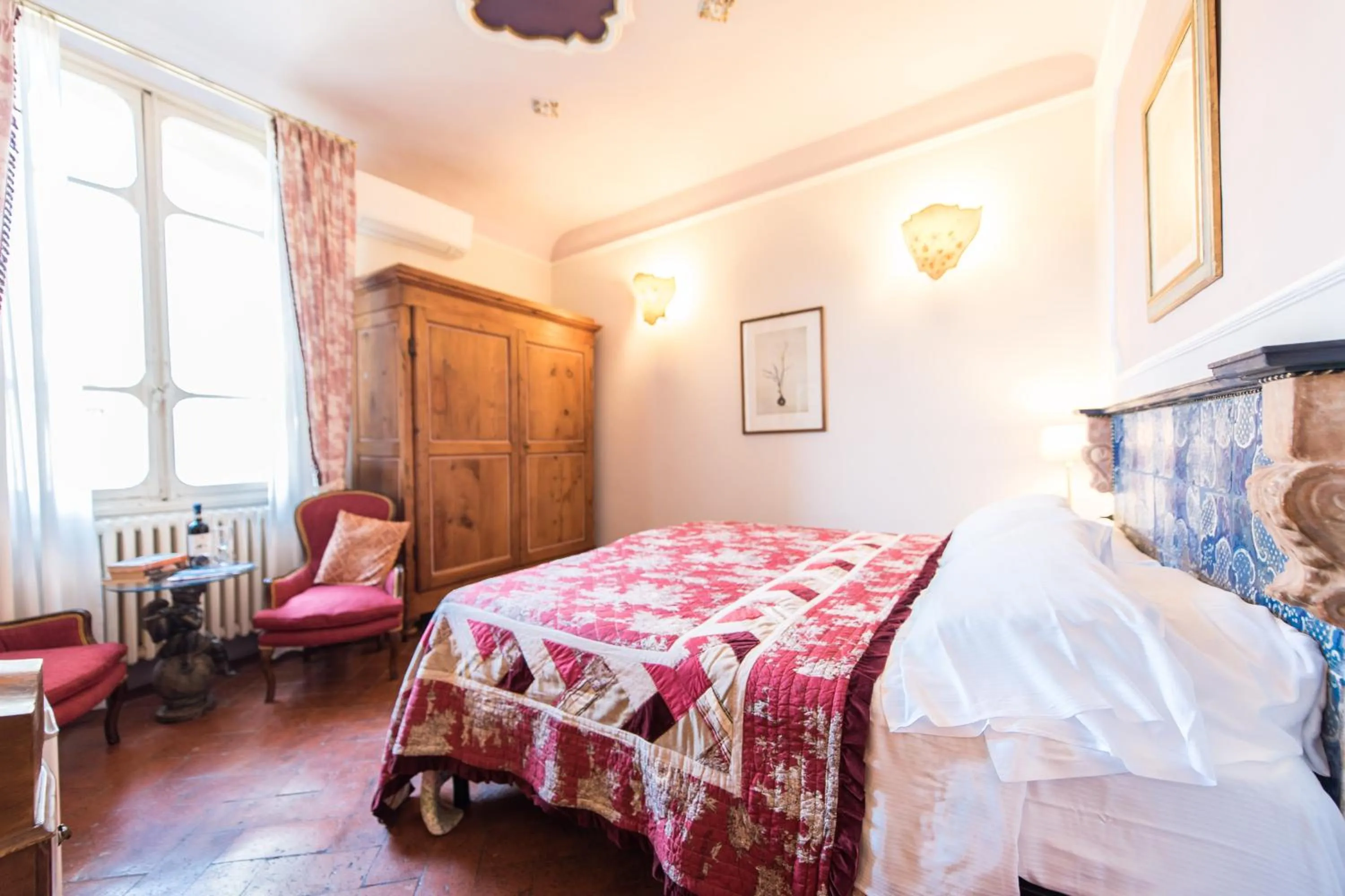 Bed in Relais & Maison Grand Tour