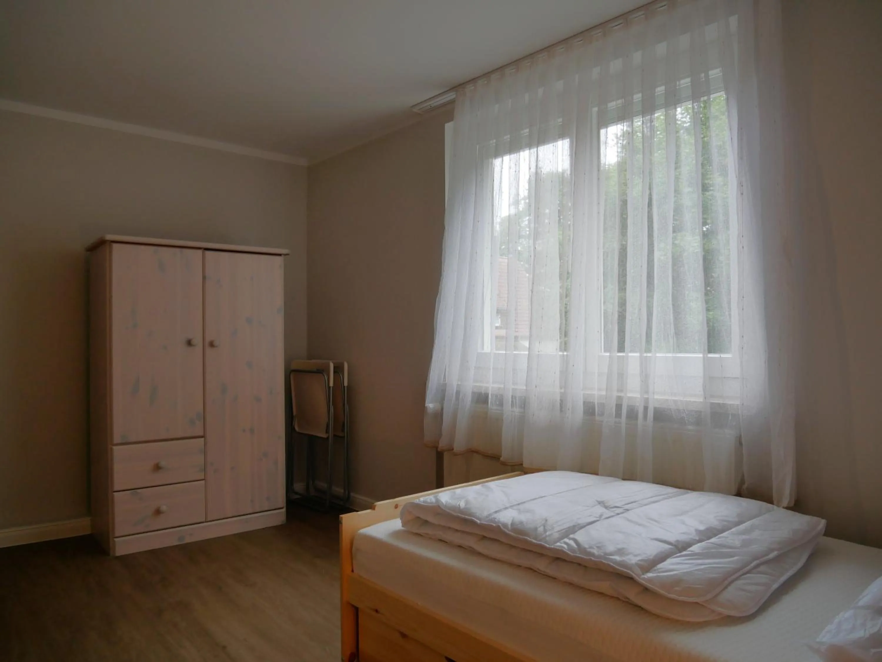 Bed in Ferienwohnungen & Bungalow Karlchen