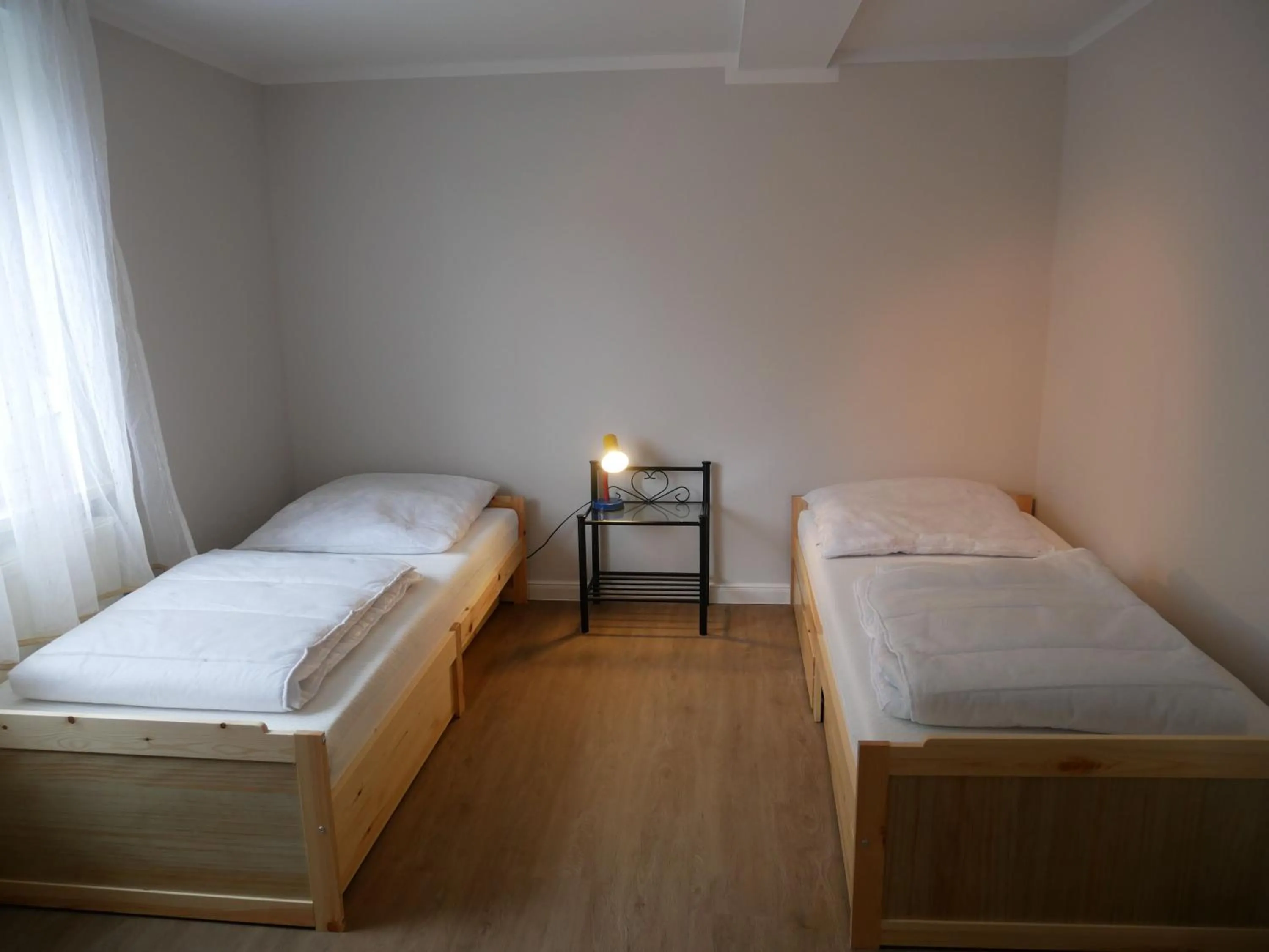 Bed in Ferienwohnungen & Bungalow Karlchen