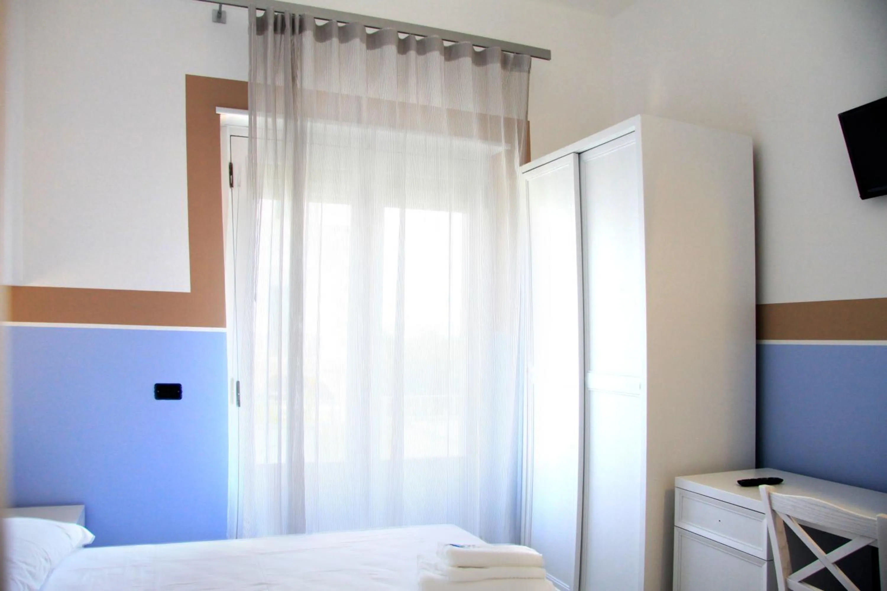 Bedroom in Hotel Città Bella