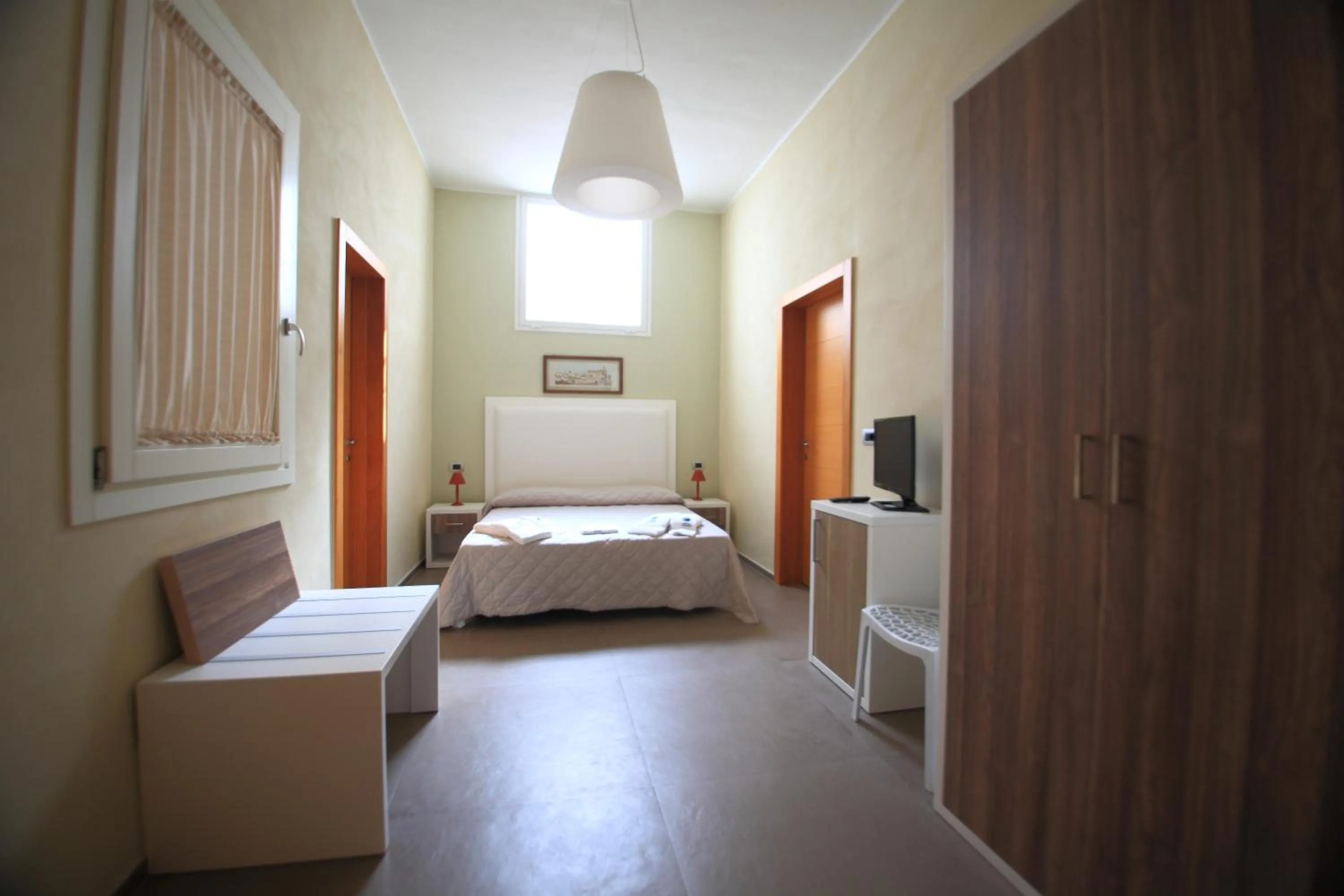 Photo of the whole room in Hotel Città Bella