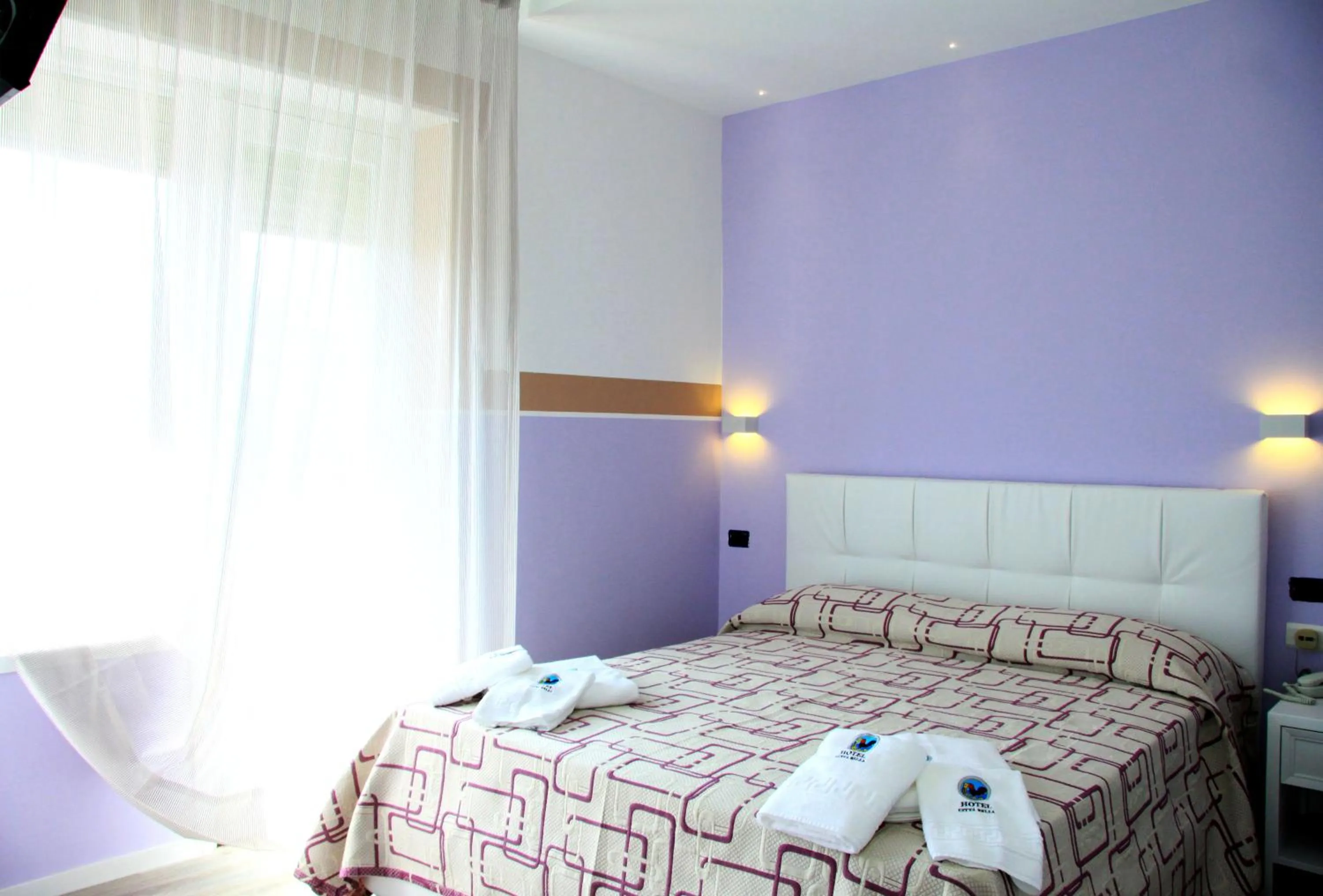 Bedroom in Hotel Città Bella
