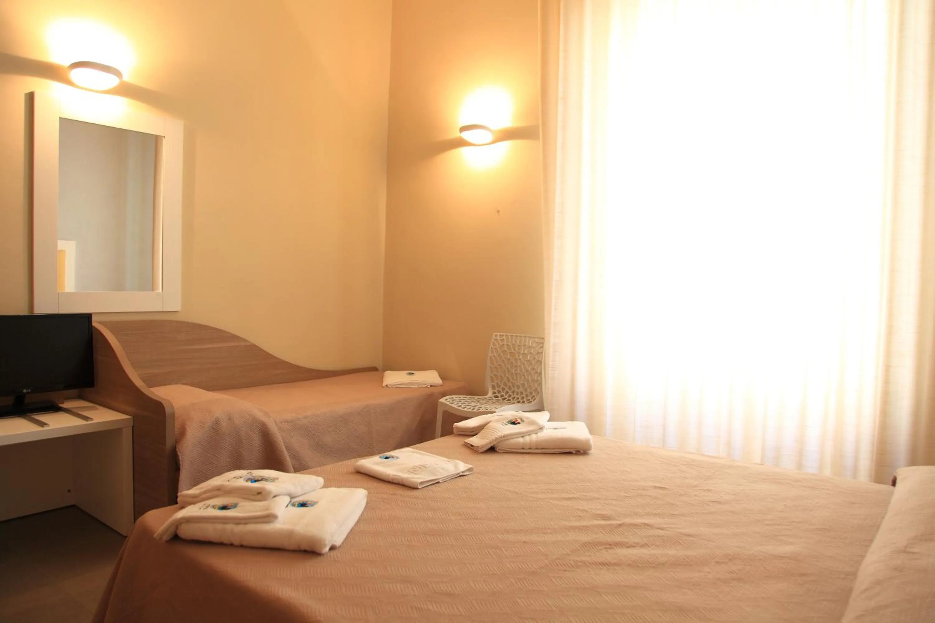 Photo of the whole room in Hotel Città Bella