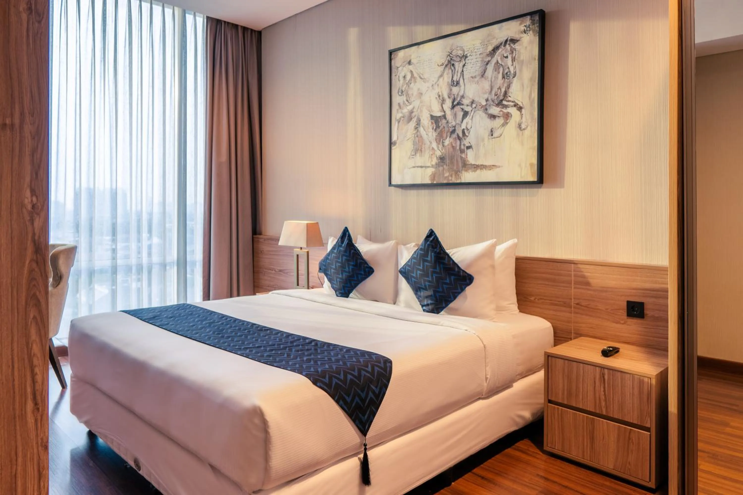 Bedroom, Bed in Azana Suites Hotel Antasari